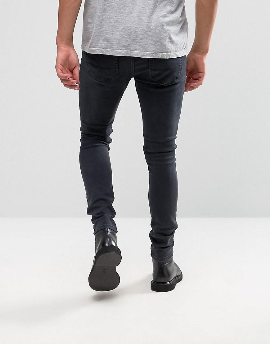 ASOS Denim Super Skinny Jeans With Extreme Rips in Black for Men - Lyst