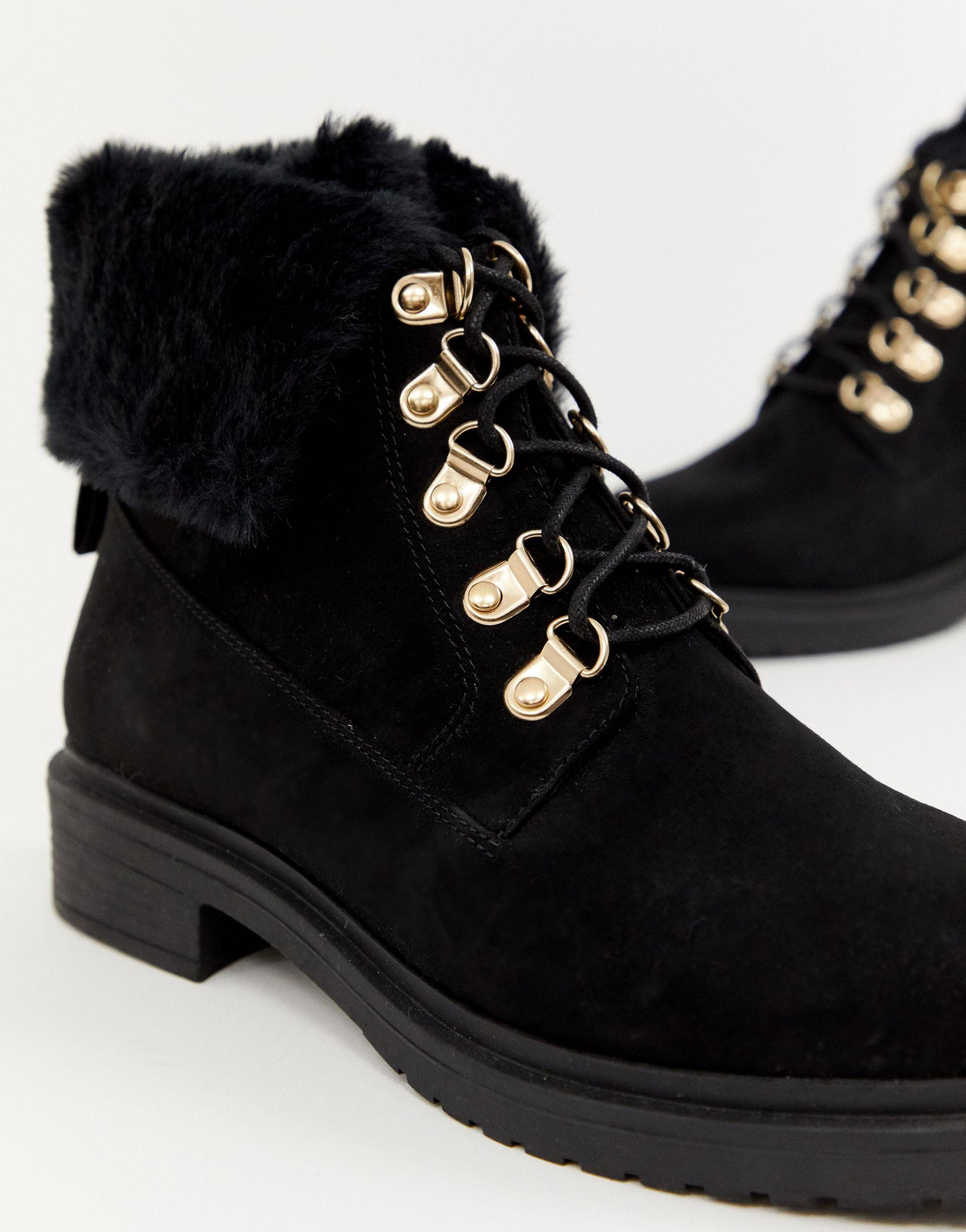 black fur lined ankle boots