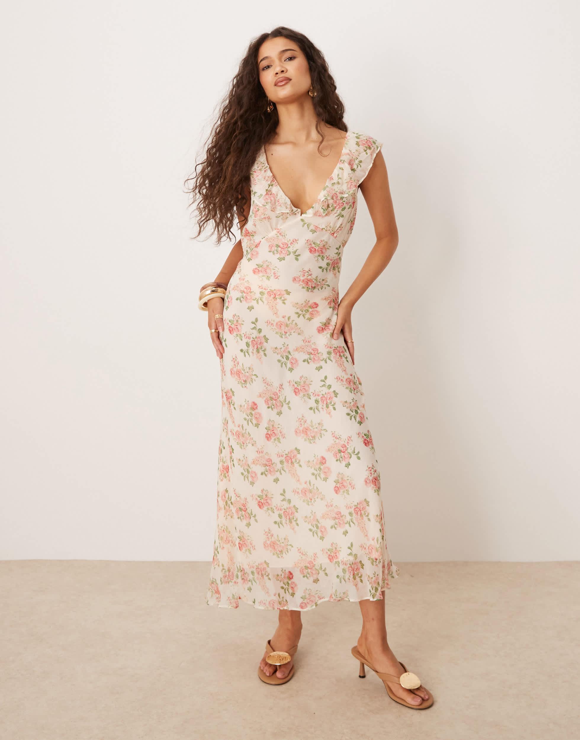 Robe longueur mollet à volants et col v imprimé fleurs Mango en