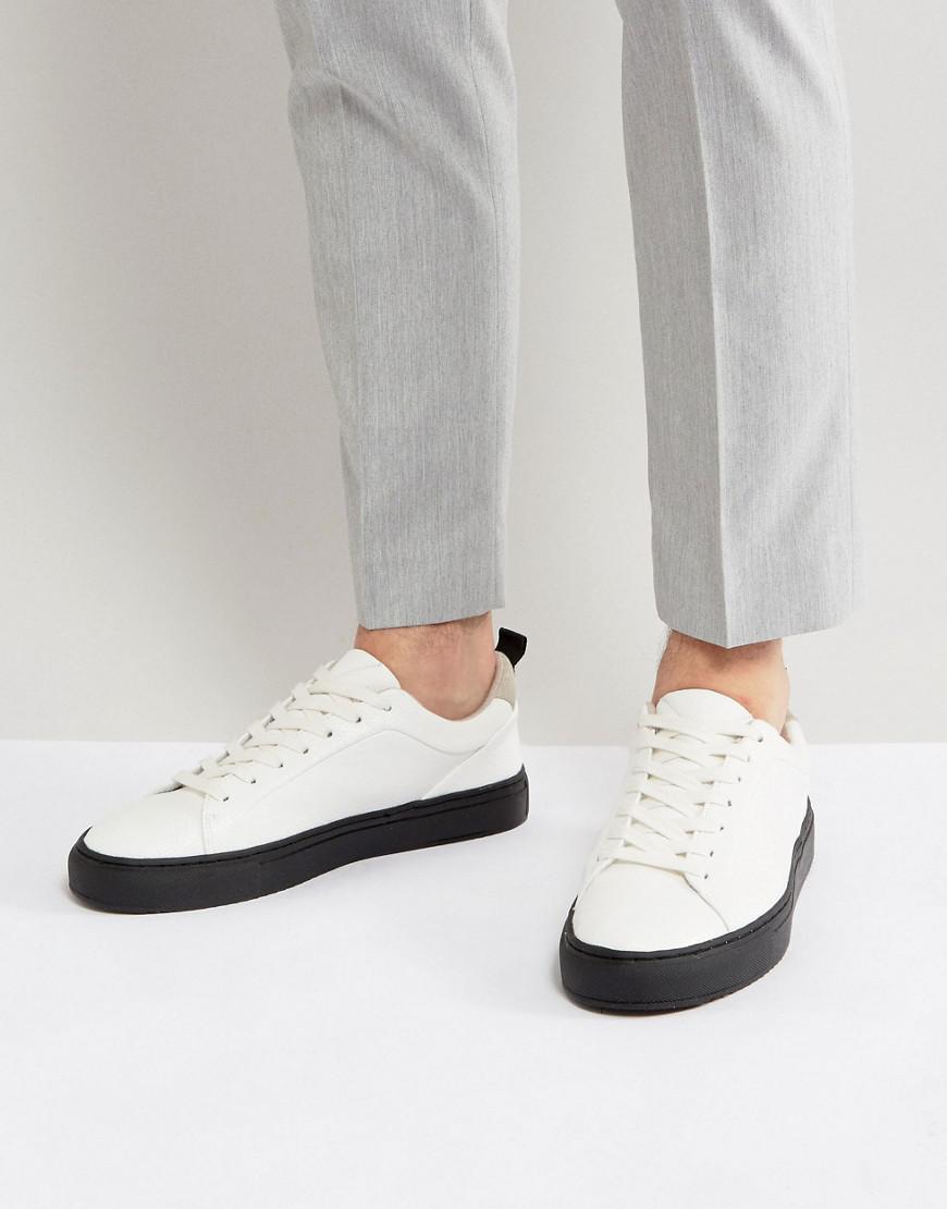 ASOS Men's Sneakers In White With Contrast Black Sole