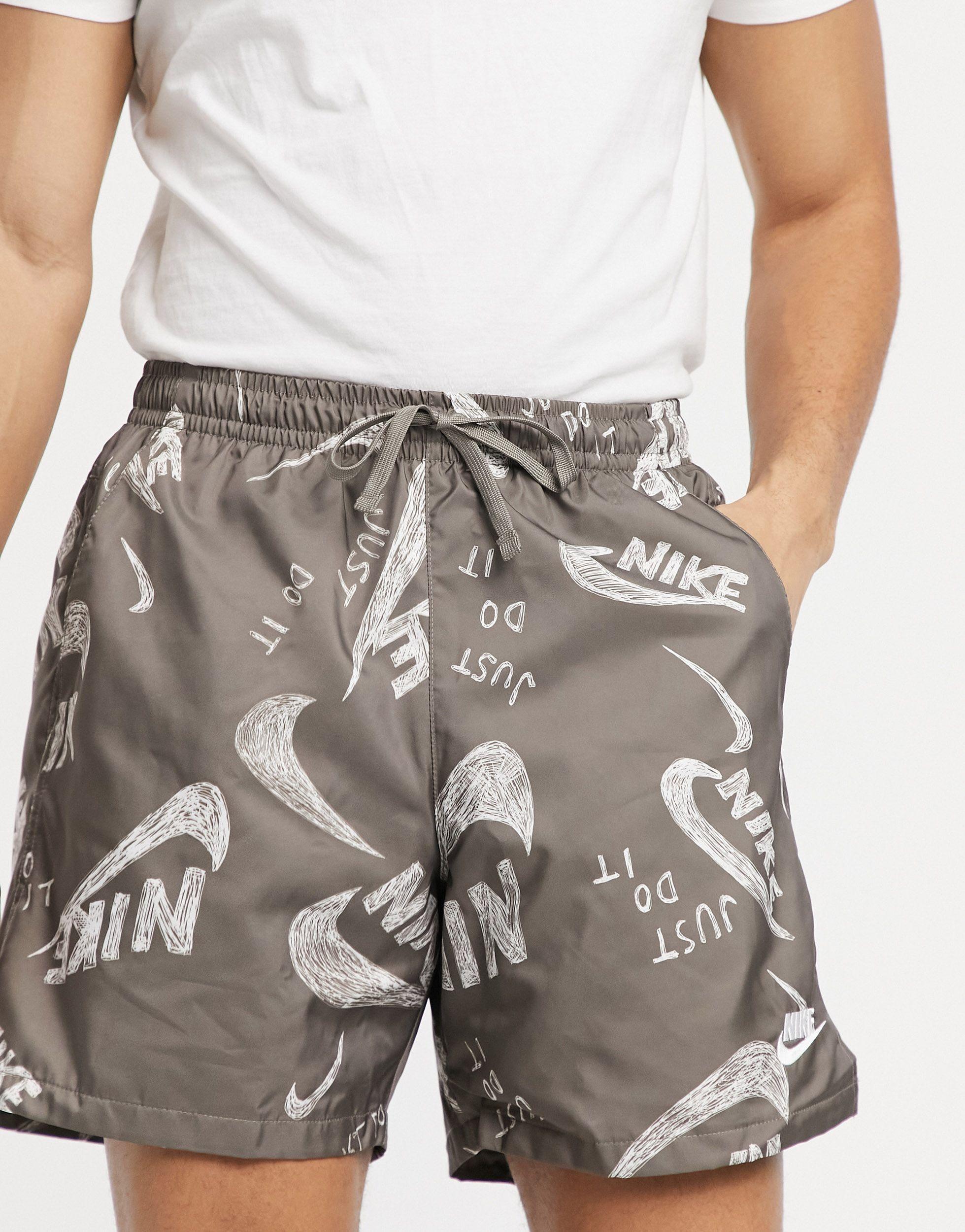 Nike All Over Logo Print Woven Shorts in Brown for Men | Lyst