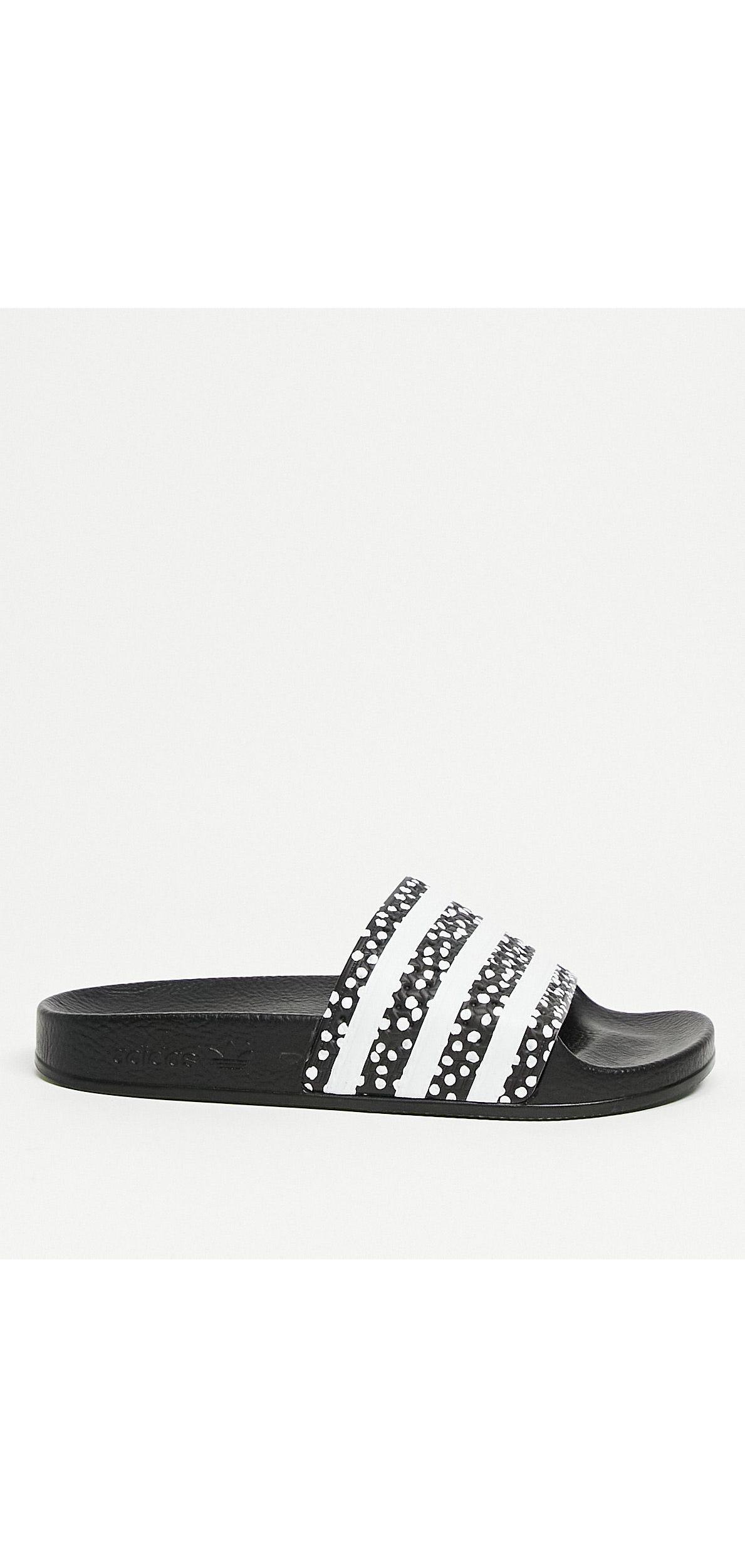 adidas Originals Adilette - Slippers Met Stippenprint in het Zwart | Lyst NL