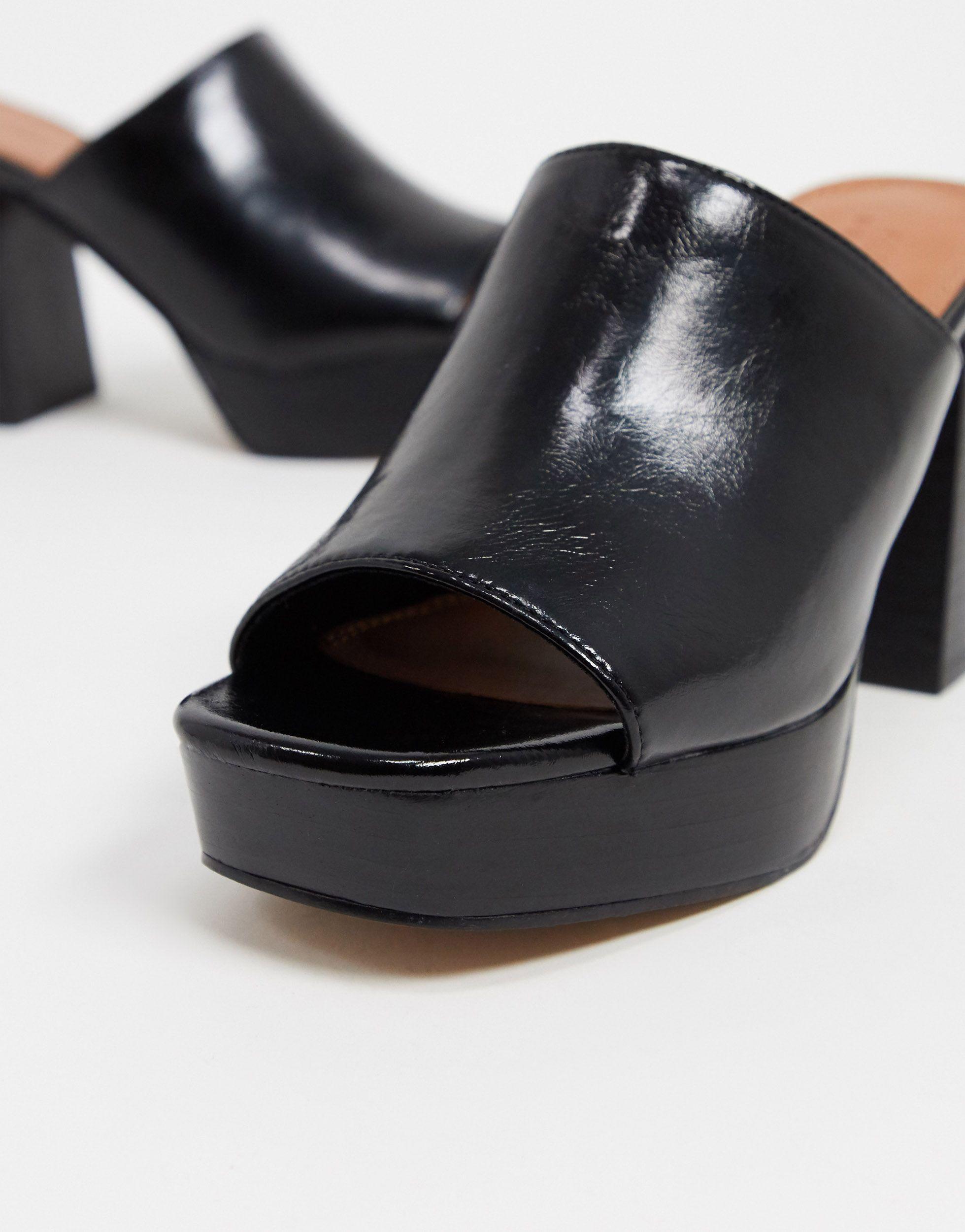 black platform mules