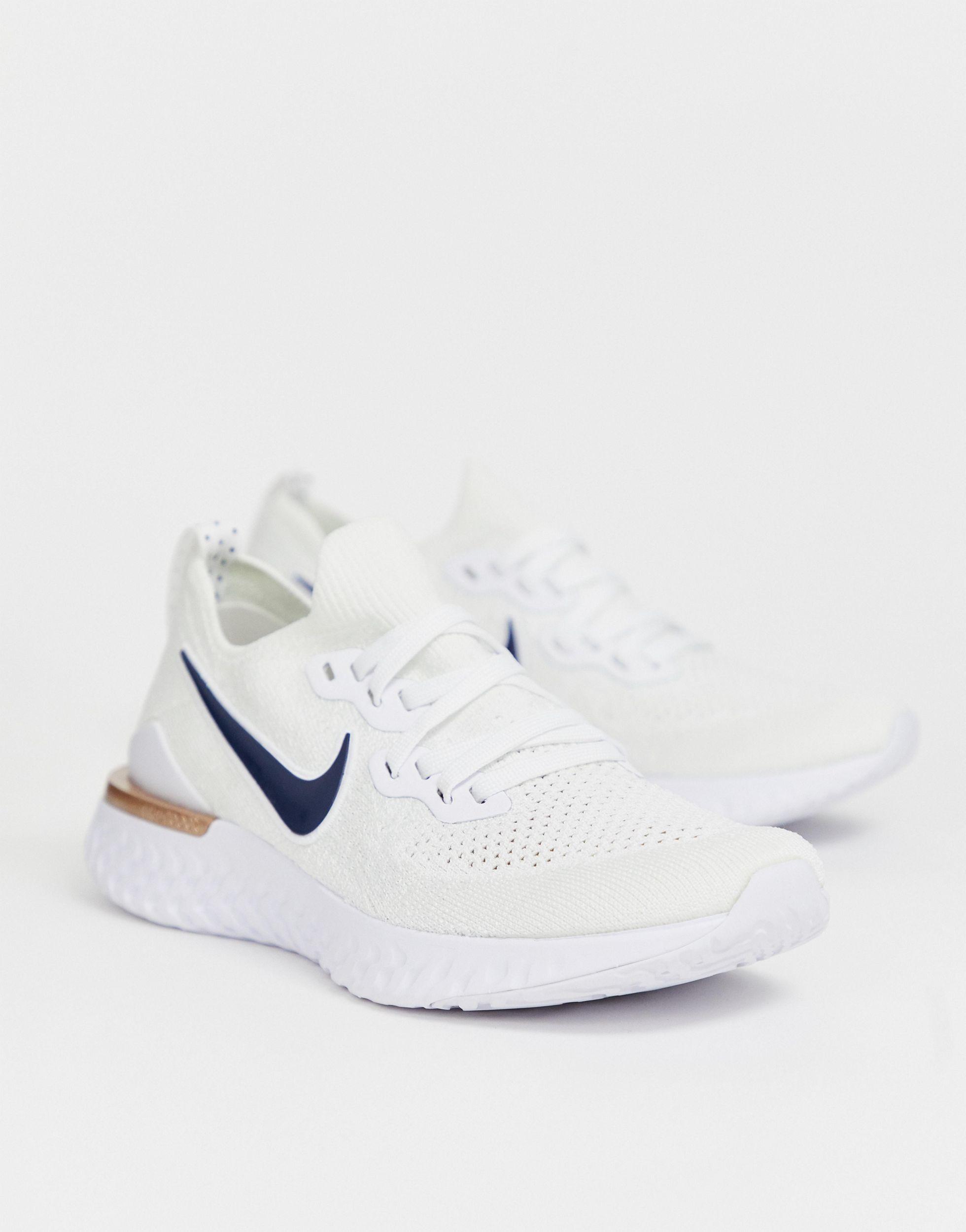 nike running epic react flyknit trainers in white and rose gold