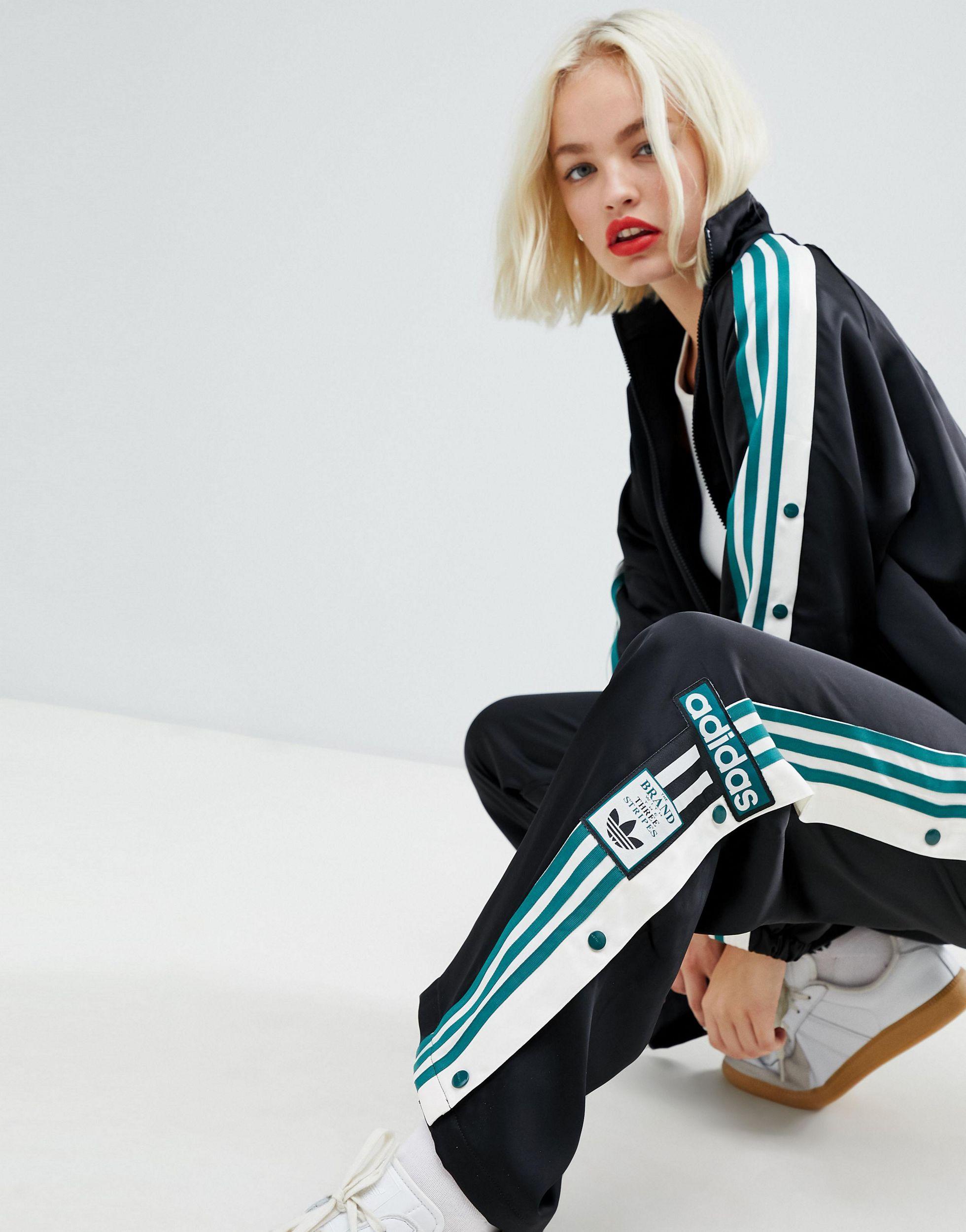 Pantalón negro con botones adidas Originals de color Negro | Lyst