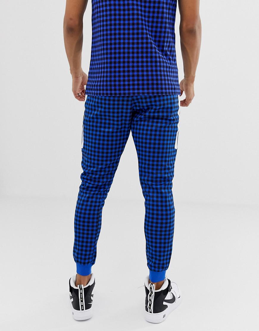 Shop Nike Red Checkered Tracksuit | UP TO 56% OFF