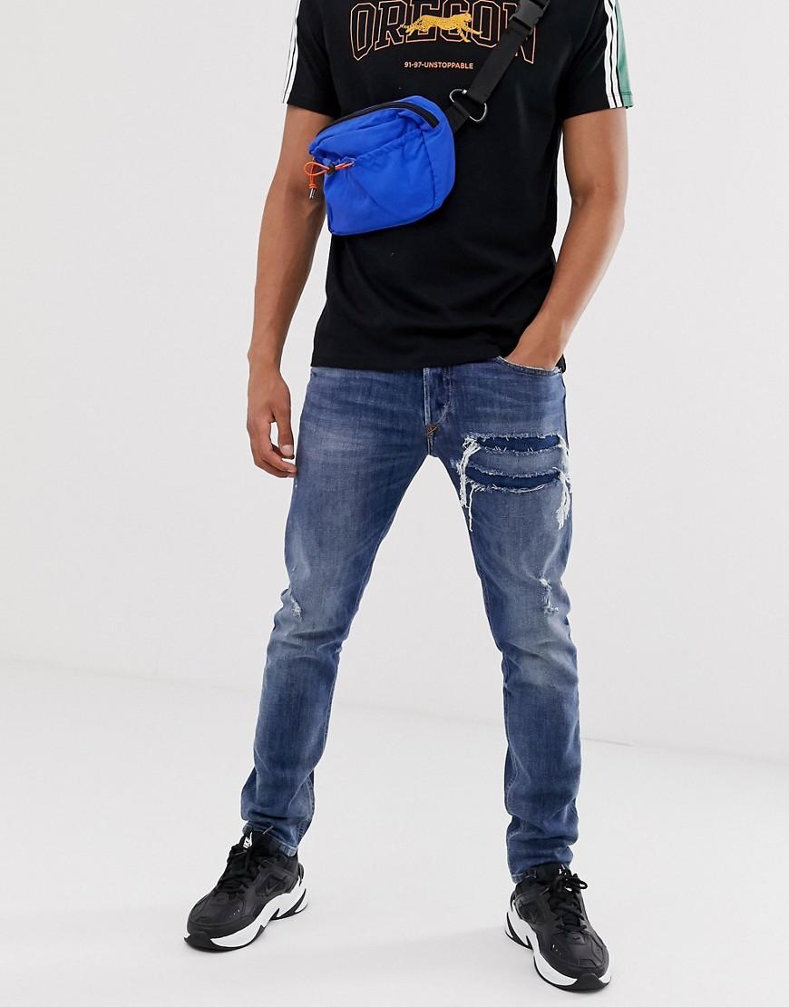 DIESEL Denim Tepphar X - Schmal geschnittene Karotten-Jeans mit Rissen und  Flicken in mittlerer 0890X-Waschung in Blau für Herren | Lyst AT