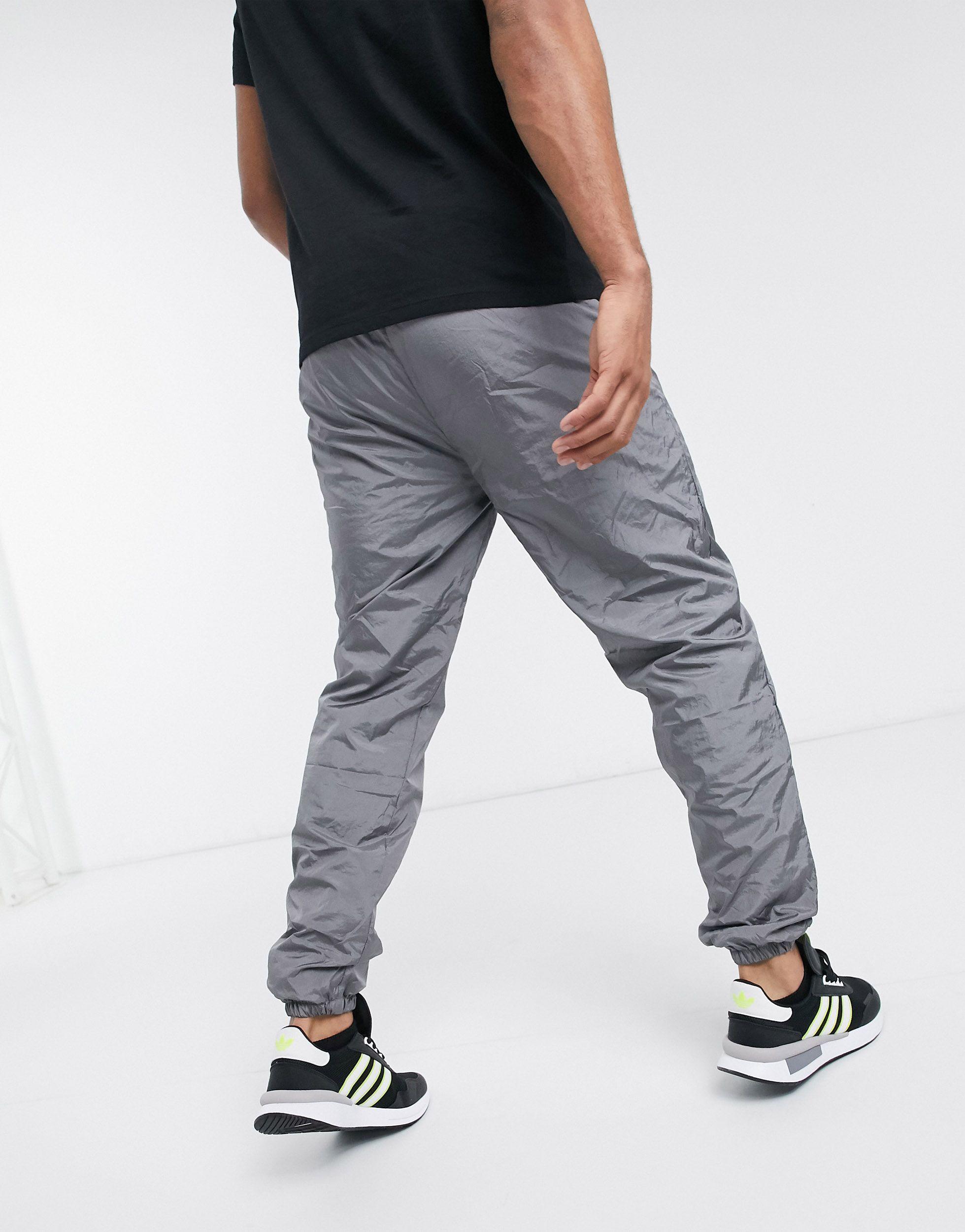 light grey trackies