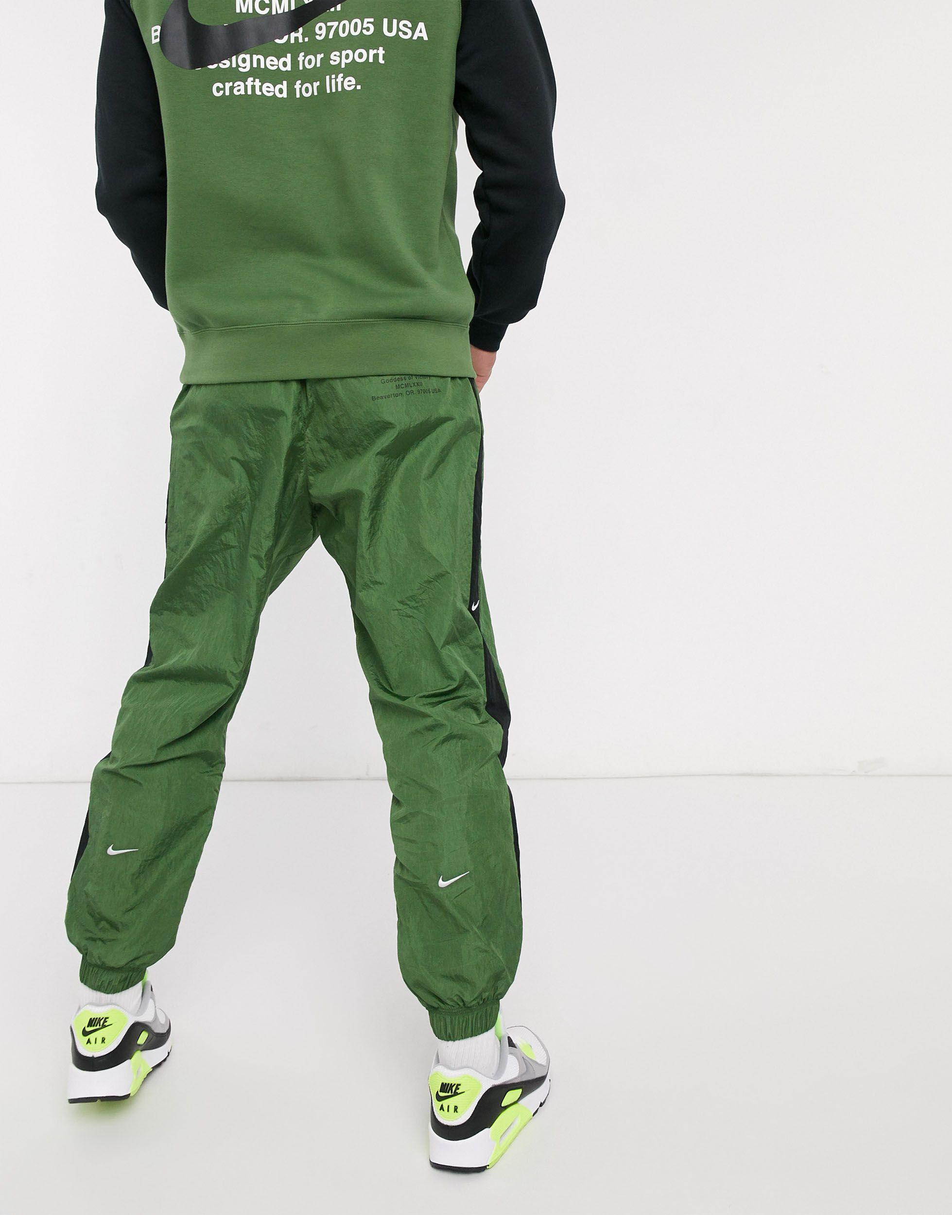 Nike Double Swoosh Joggers in Green for Men Lyst UK