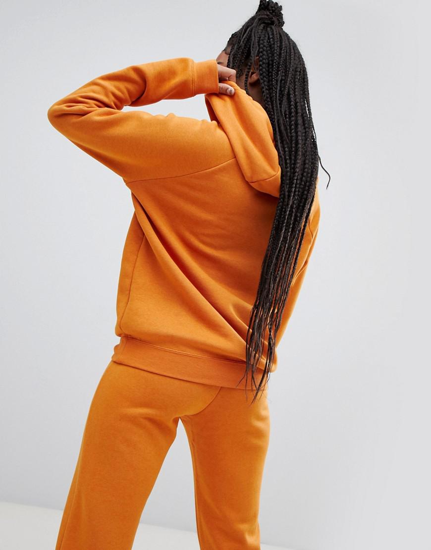 nike orange tracksuit womens