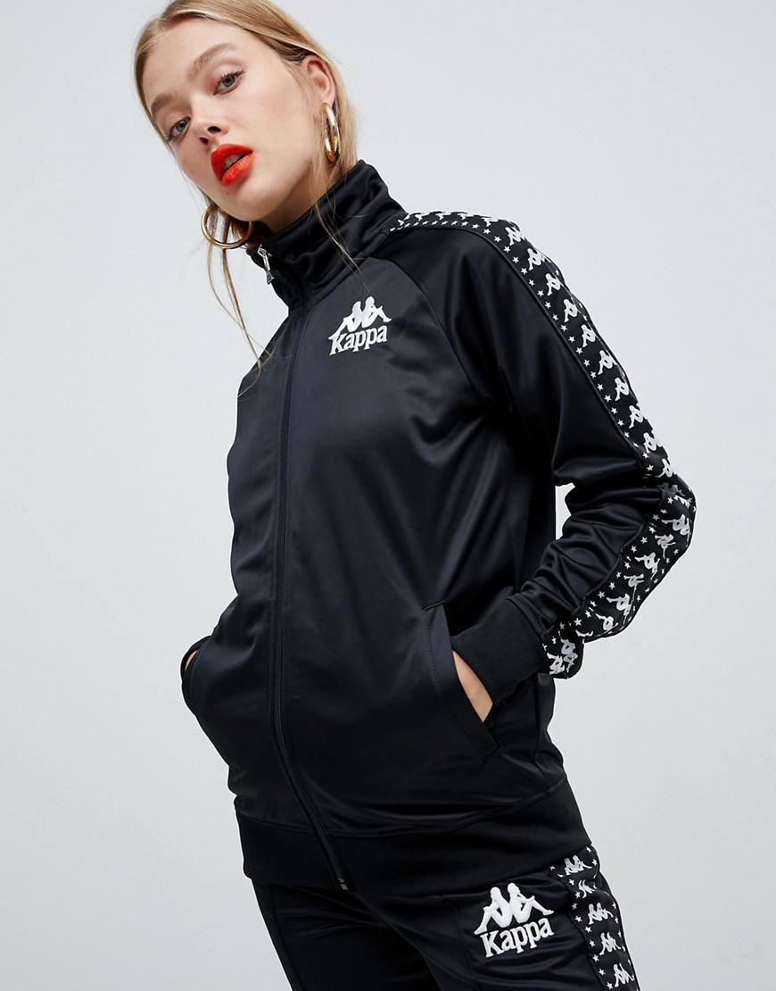 gold and black kappa tracksuit