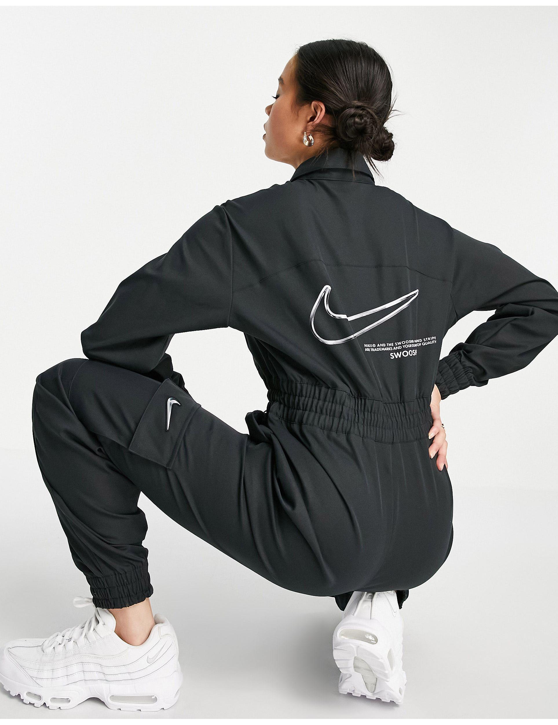 Nike Swoosh Utility Jumpsuit in Black | Lyst