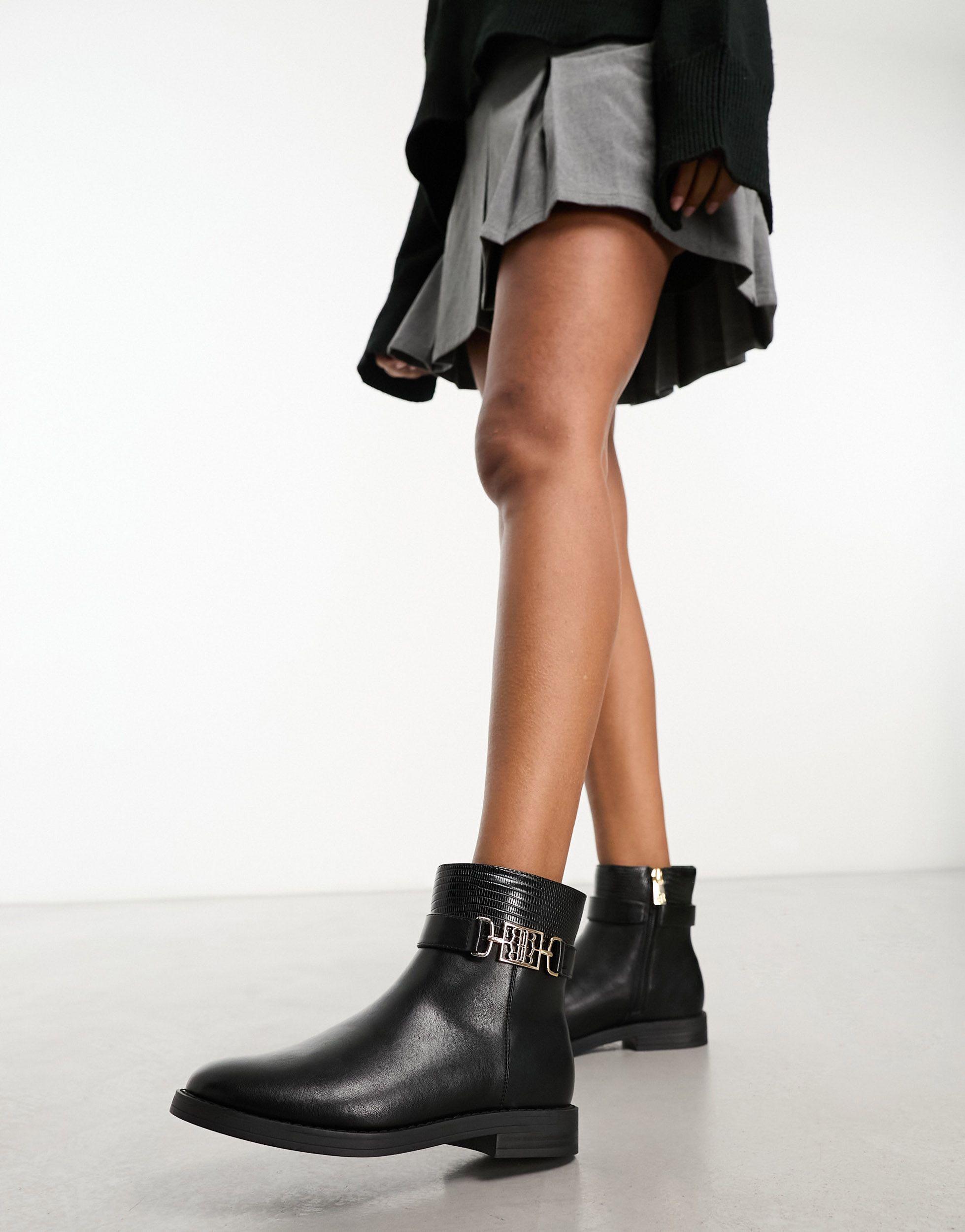 Ankle boots top with gold buckles