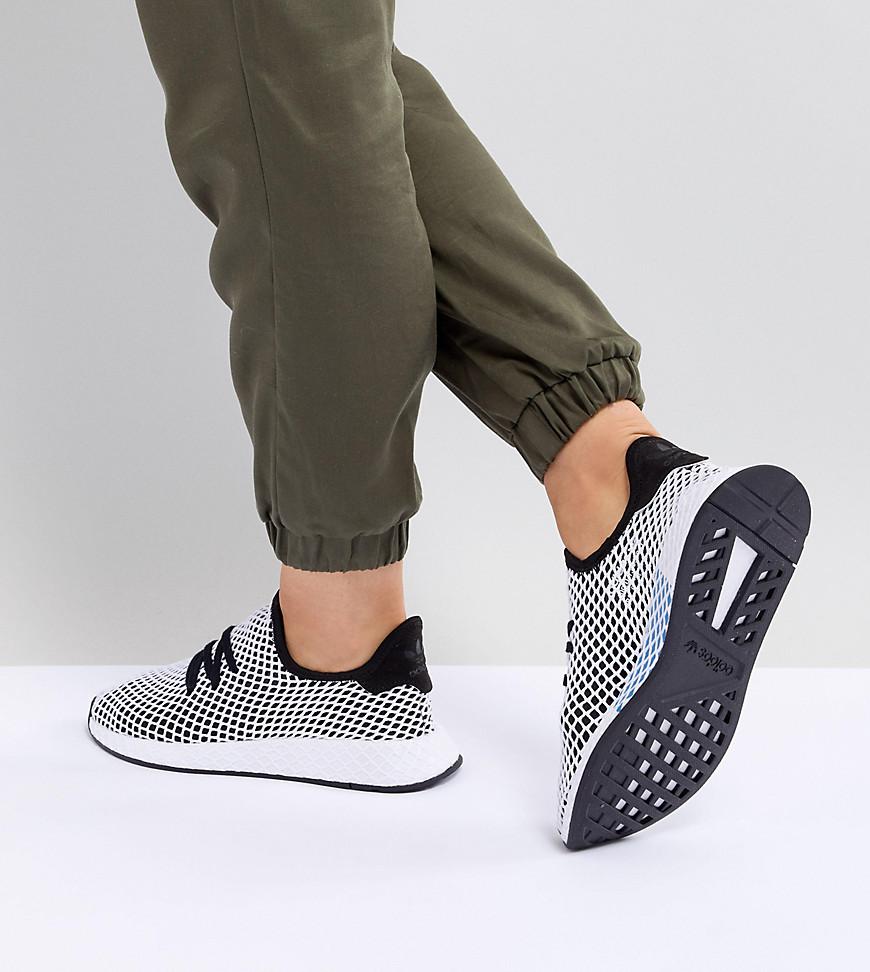 lyst adidas originali deerupt runner formatori in nero e grigio lyst adidas originali deerupt runner formatori in nero e grigio