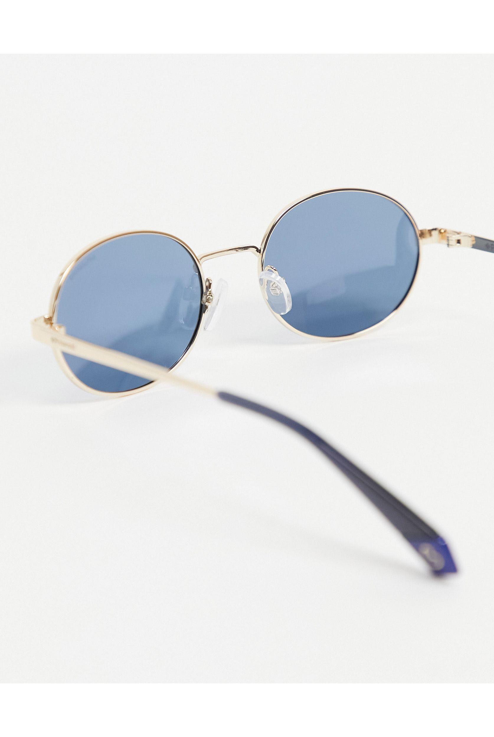 Polaroid round lens unisex sunglasses Clearance