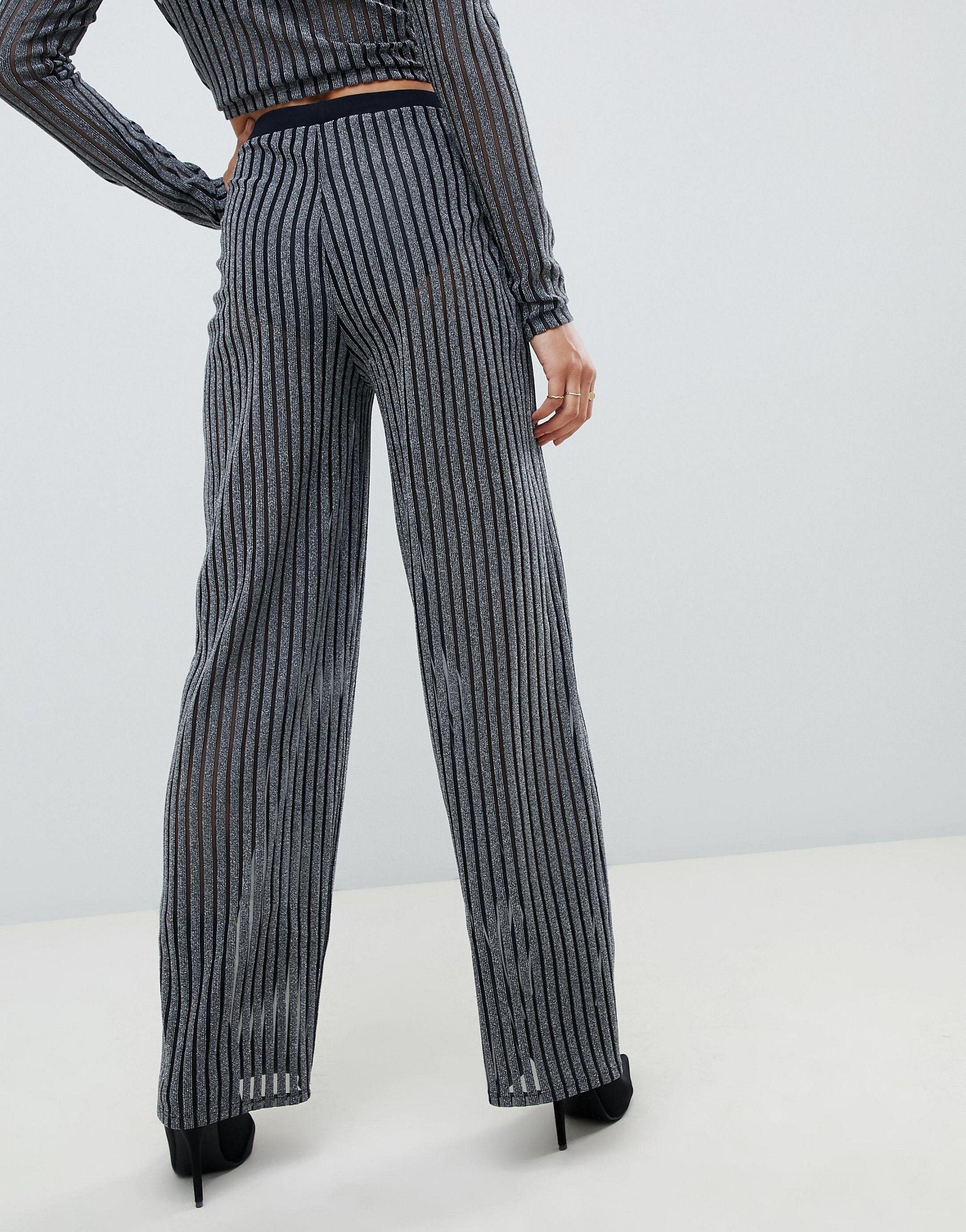 black trousers with silver stripe