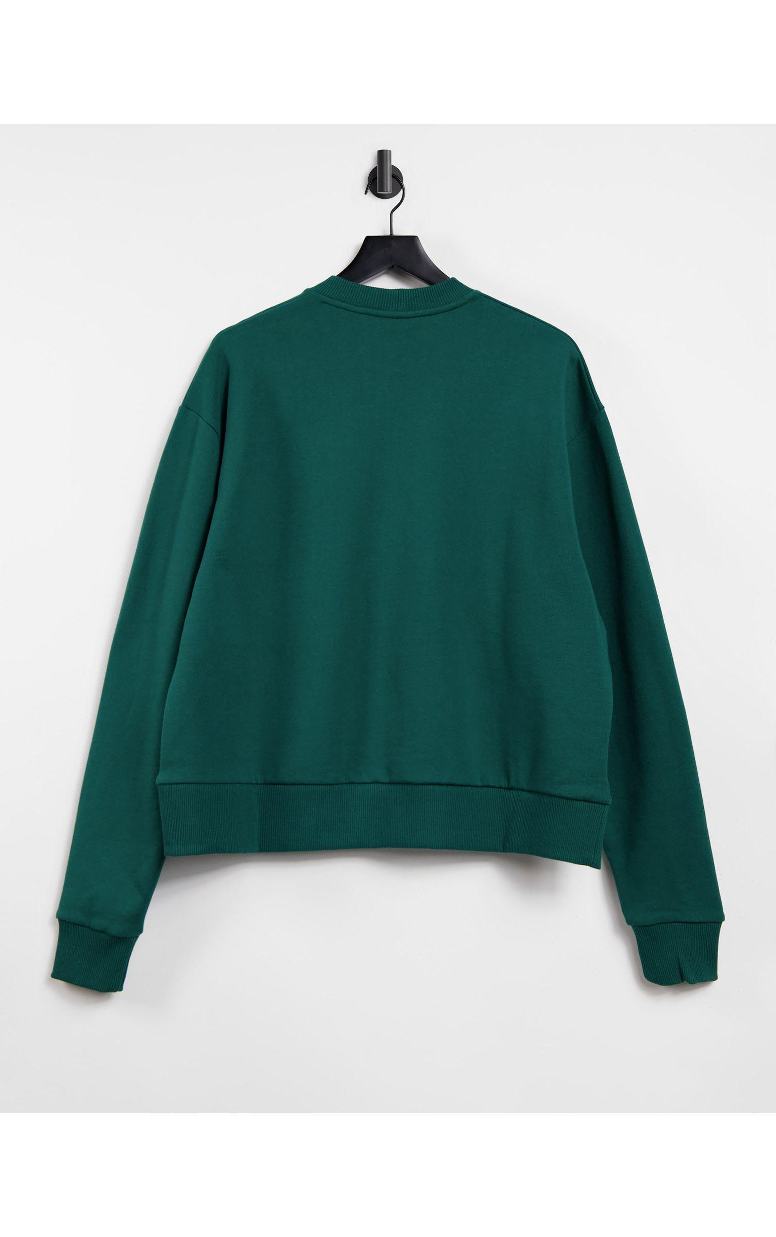 cropped green sweatshirt