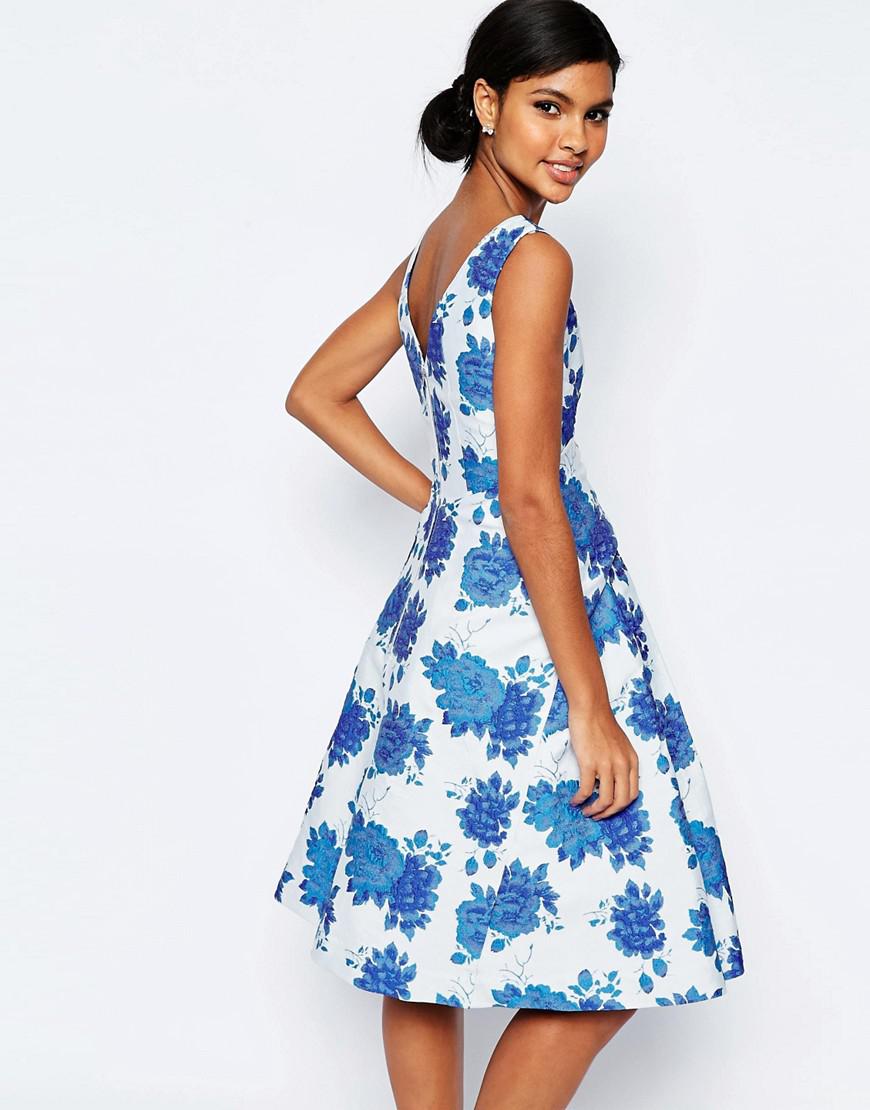 white dress with blue roses