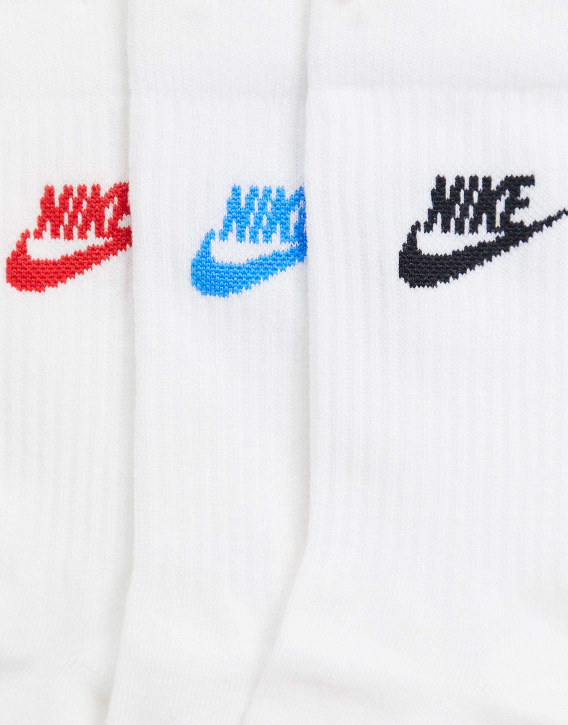 White nike socks hot sale with blue swoosh