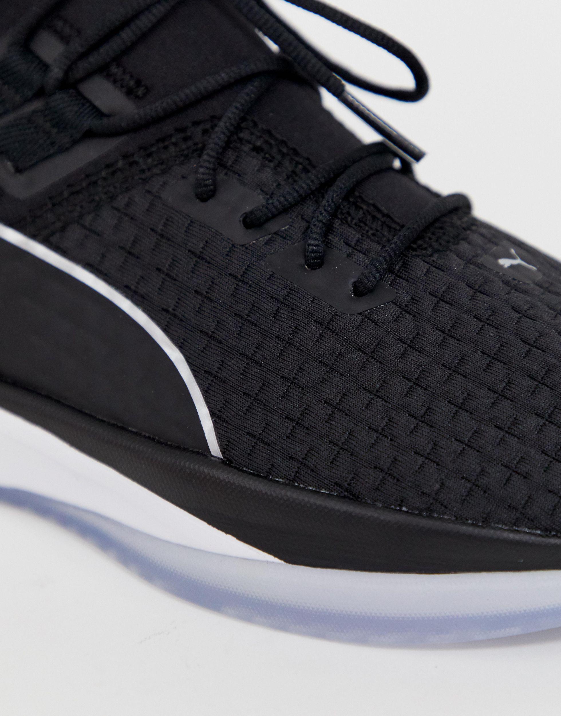 puma training jaab xt sneakers in black