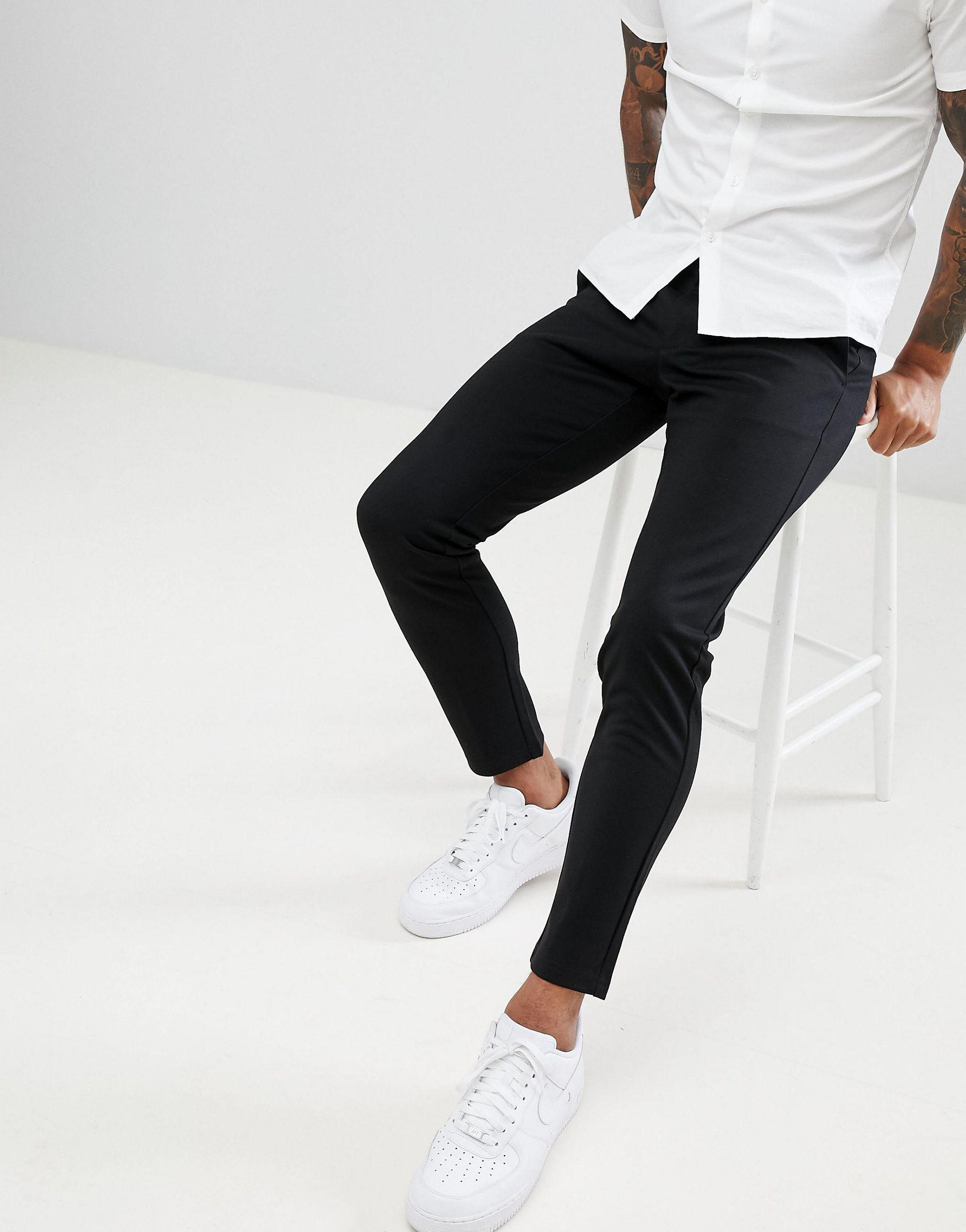 black skinny tapered trousers