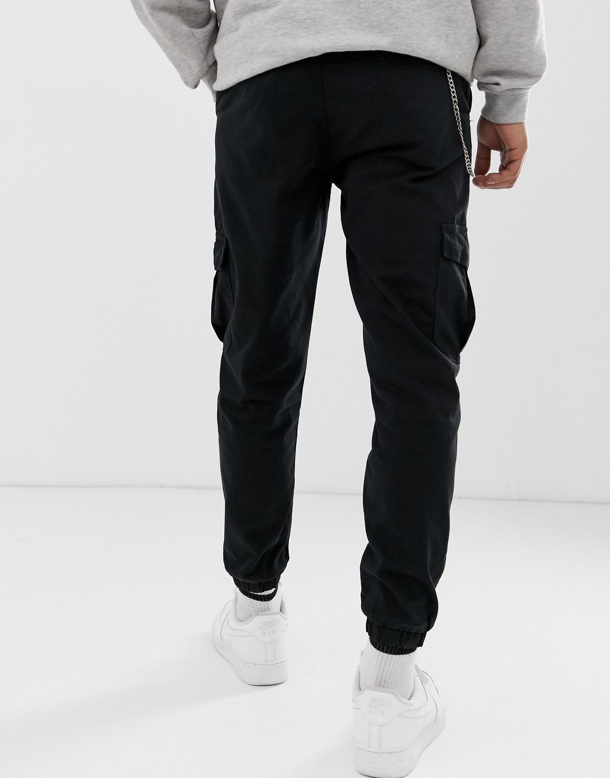 Pantalon cargo avec chaîne Bershka pour homme en coloris Noir | Lyst