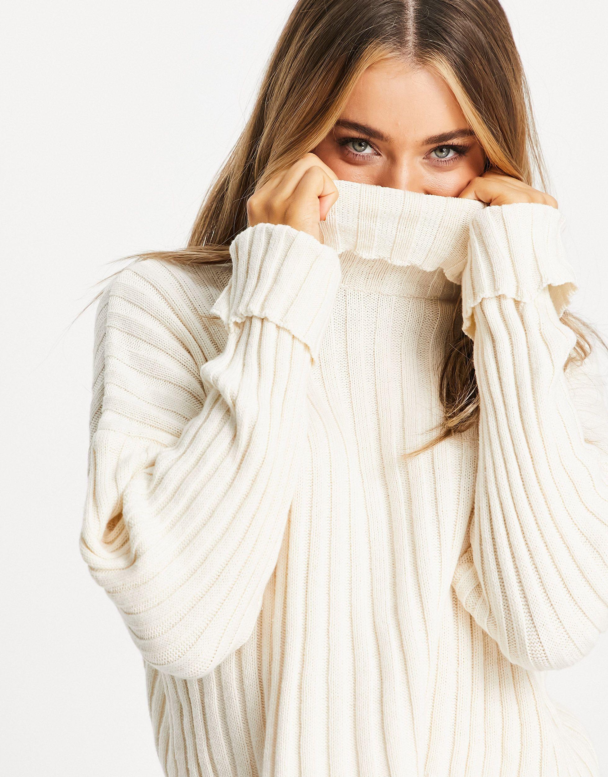 white ribbed roll neck jumper