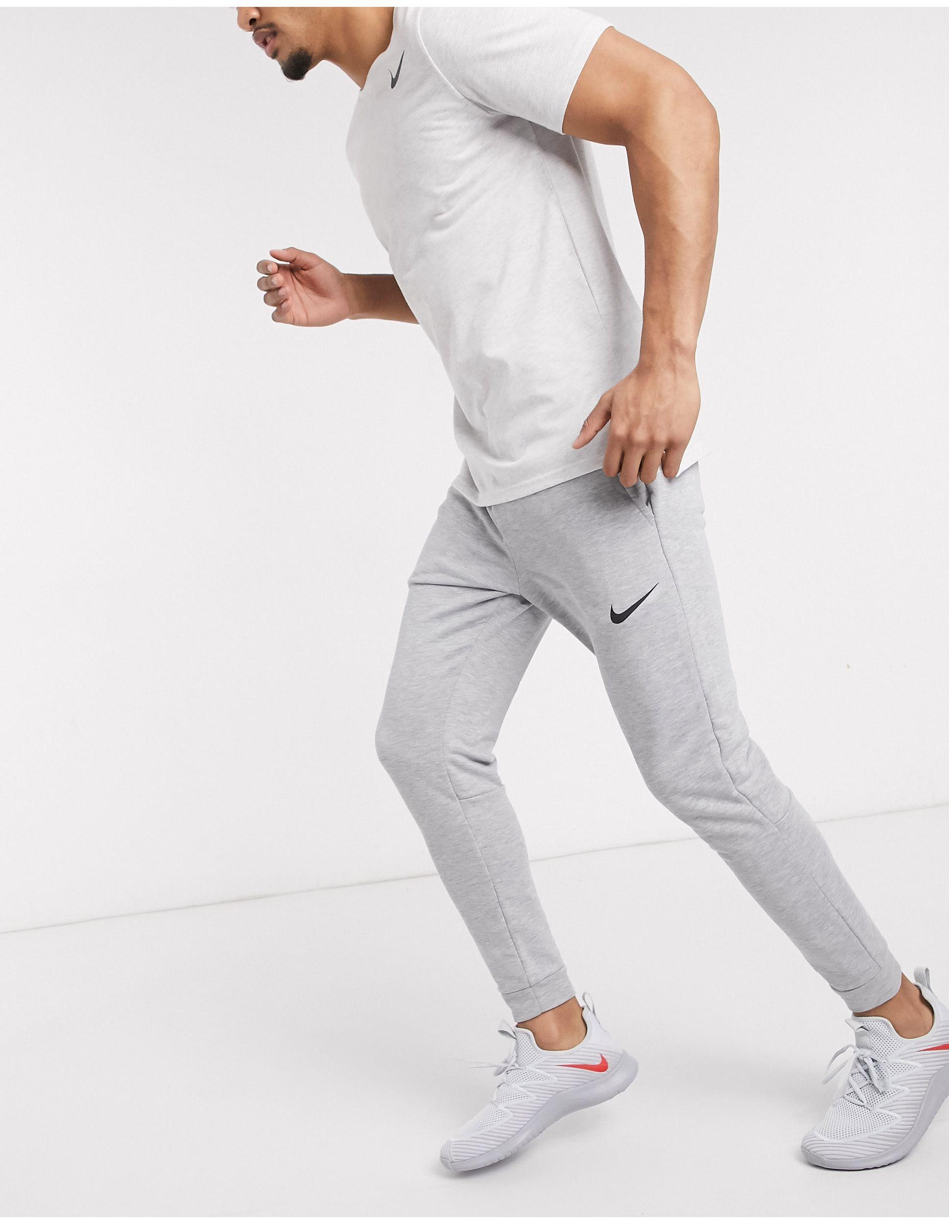 Nike – dri-fit – fleece-jogginghose mit engen bündchen für Herren - Lyst
