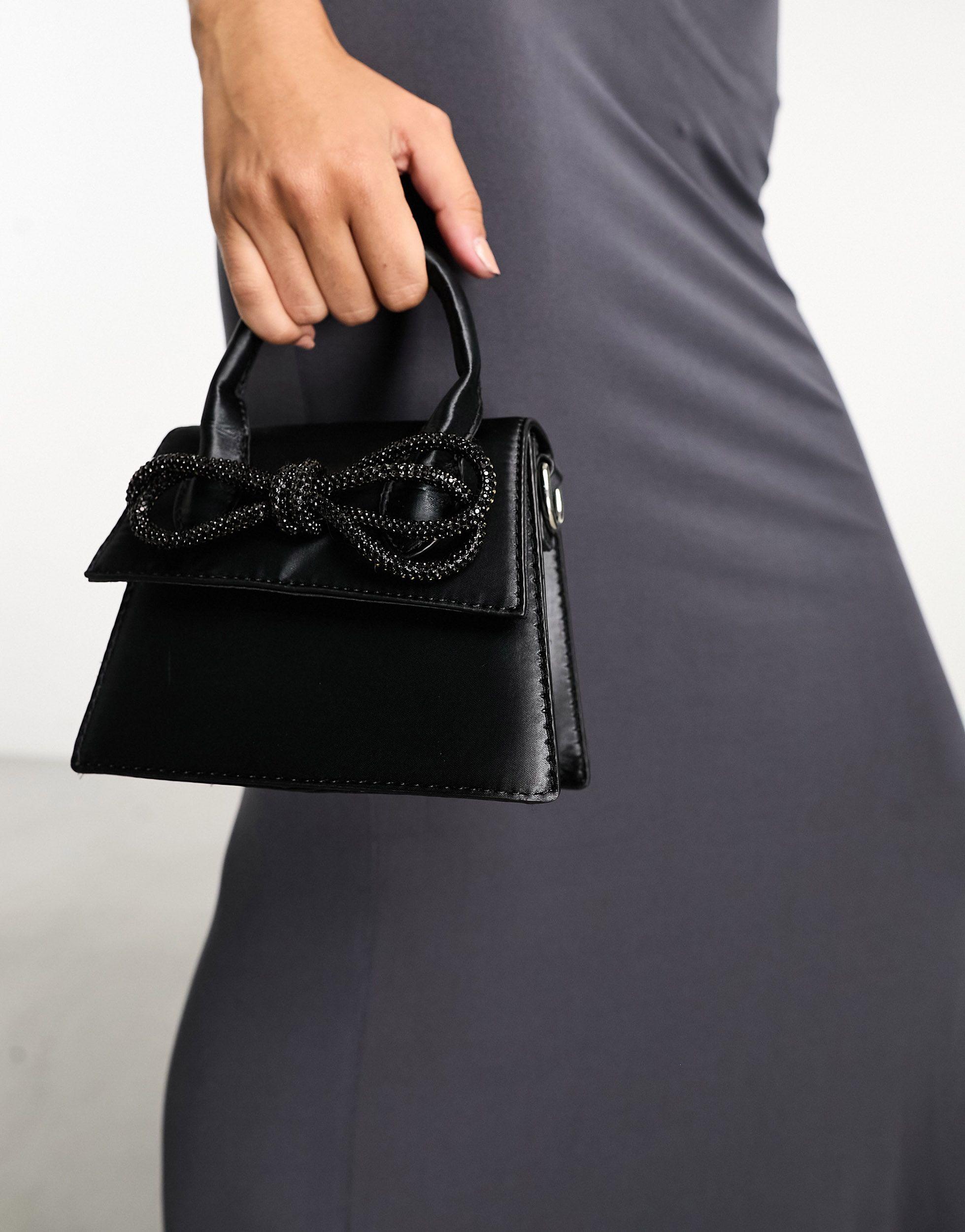 https://cdna.lystit.com/photos/asos/ec295100/public-desire-Black-Indy-Mini-Cross-Body-Bag-With-Embellished-Bow.jpeg