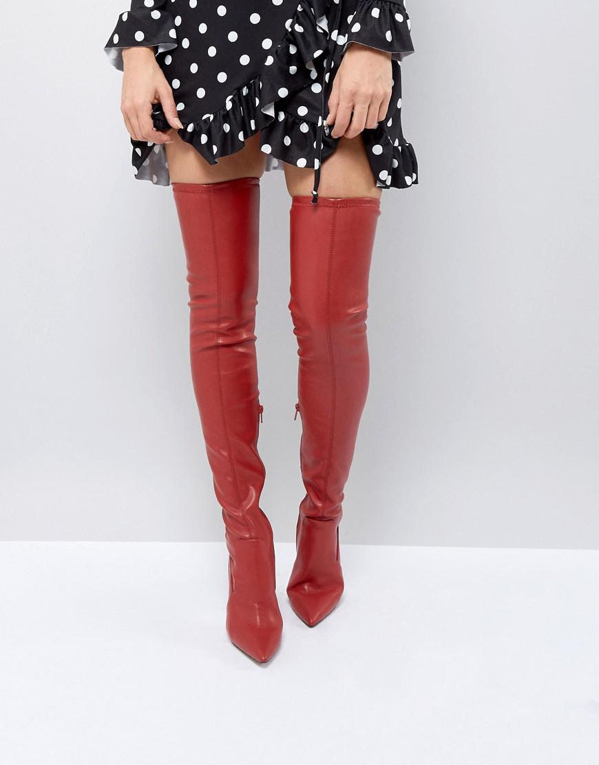 red leather boots over the knee