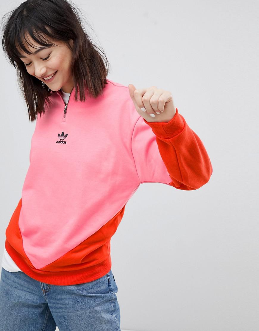 pink and red adidas hoodie