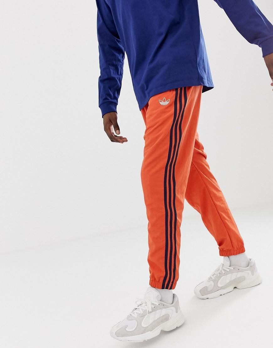 Joggers tissé à 3 bandes - Orange adidas Originals pour homme | Lyst