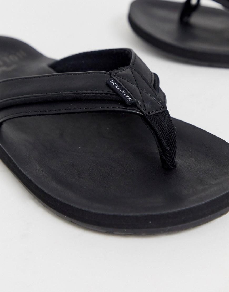 hollister black flip flops