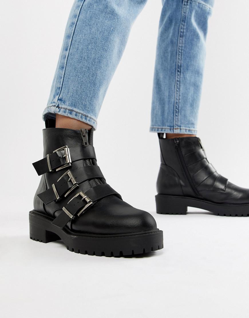 chunky boots with buckles