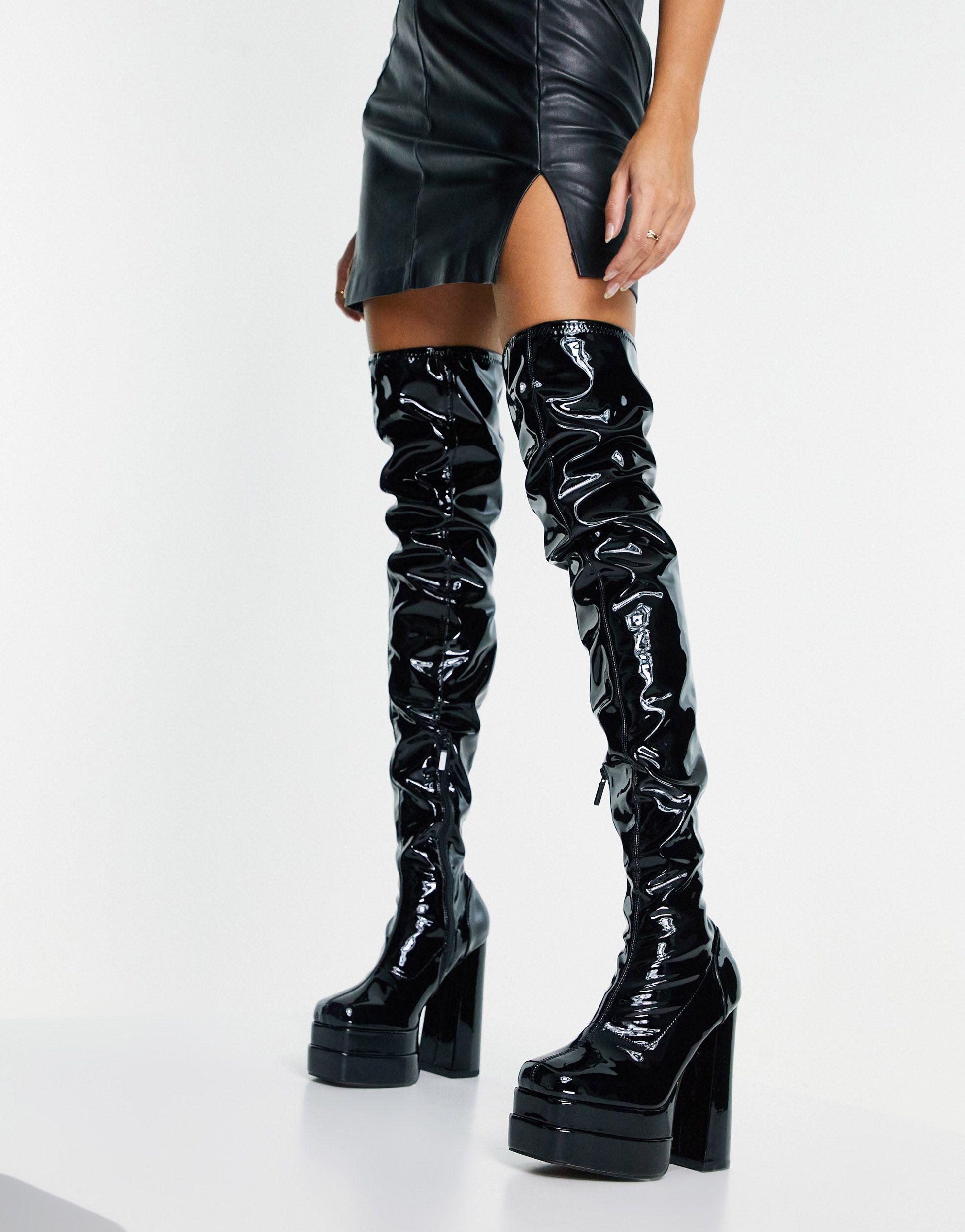 black vinyl platform boots