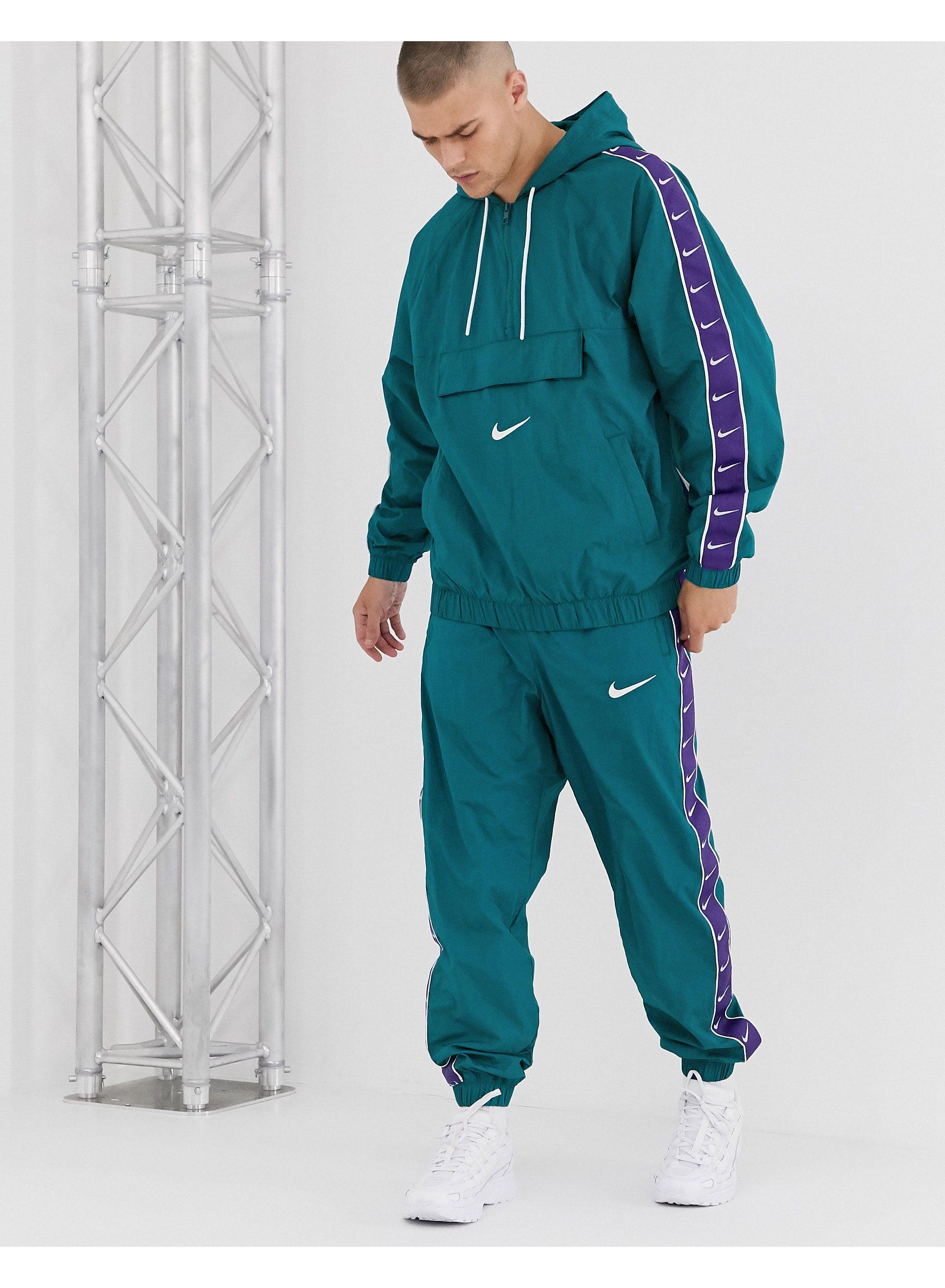 Nike Logo Taping Overhead Jacket in Green for Men | Lyst