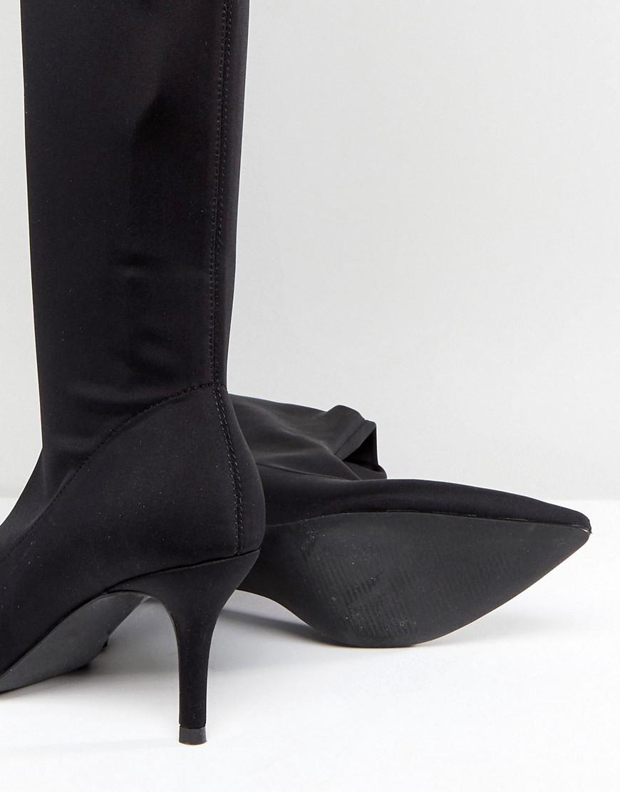 stretch high heel boots