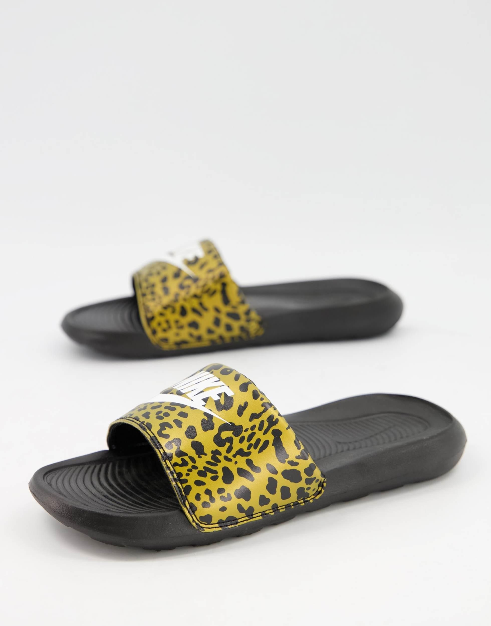 Nike animal print sliders best sale