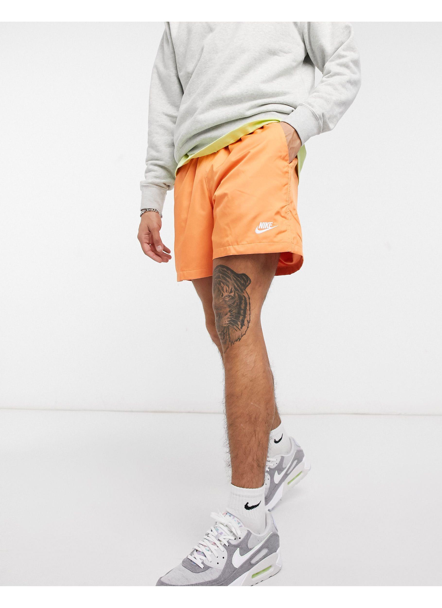 Nike Club Essentials Woven Flow Shorts in Orange for Men | Lyst