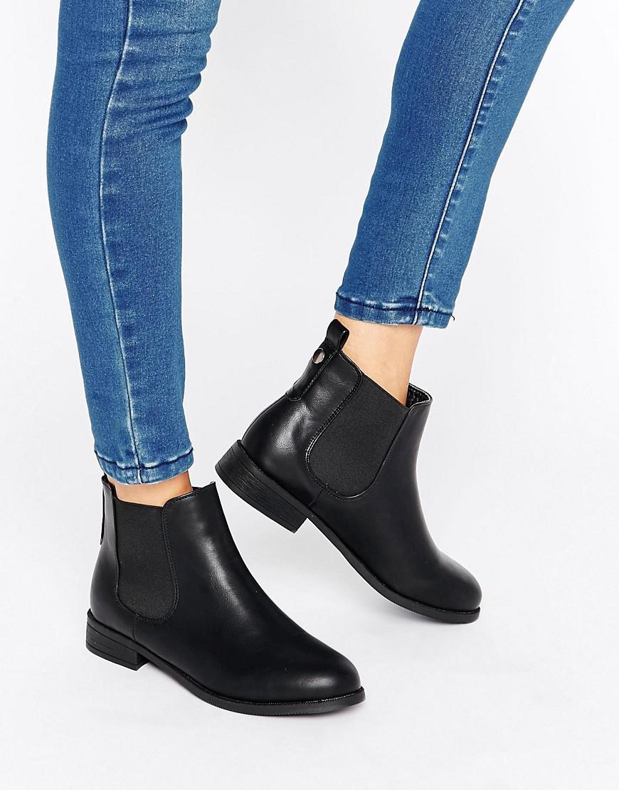 black flat chelsea boots