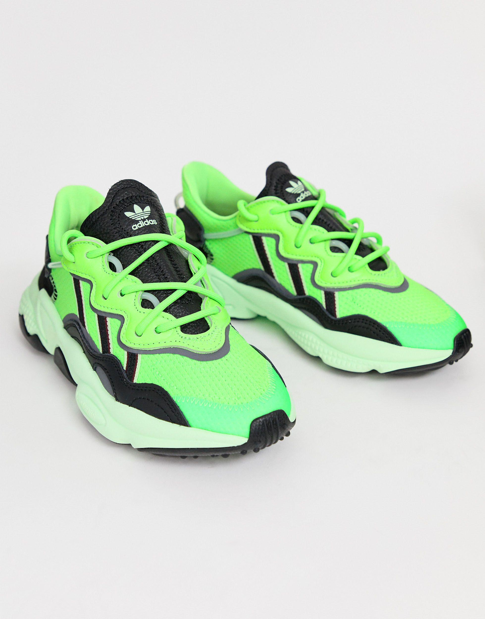 green ozweego trainers