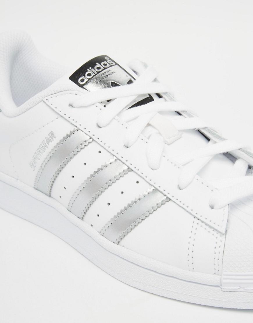 adidas white and silver superstar trainers