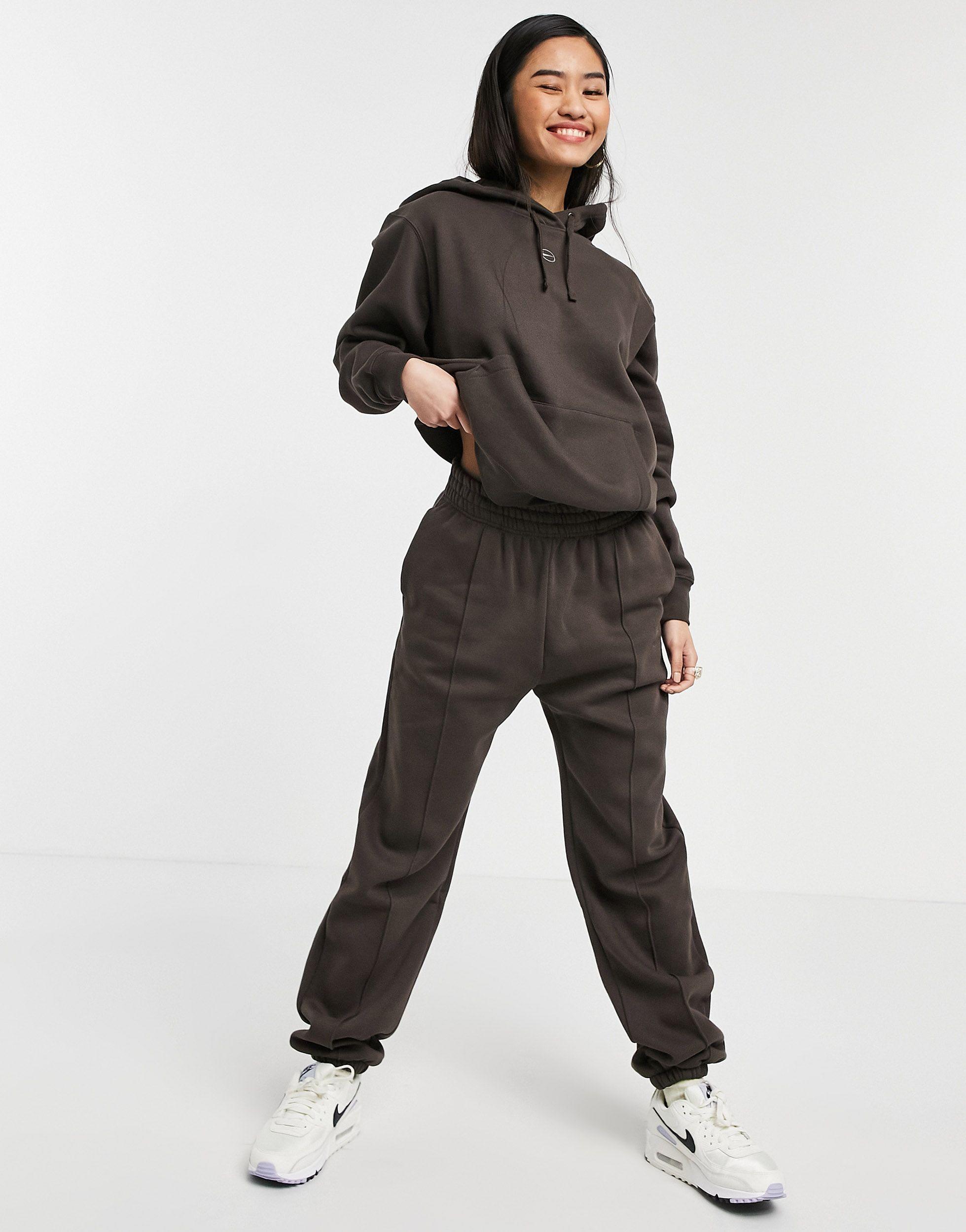 metallic swoosh nike tracksuit