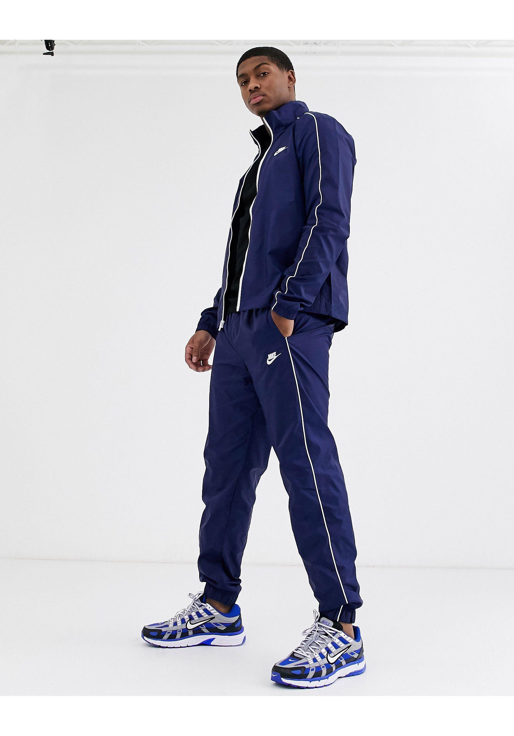 Nike Synthetic Woven Tracksuit in Navy (Blue) for Men | Lyst Australia
