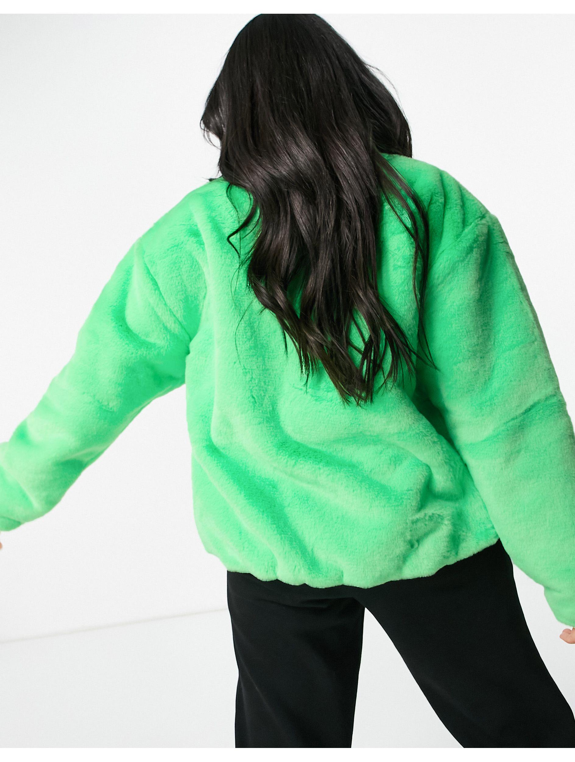 Nike Faux Fur Oversized Swoosh Jacket in Green - Lyst