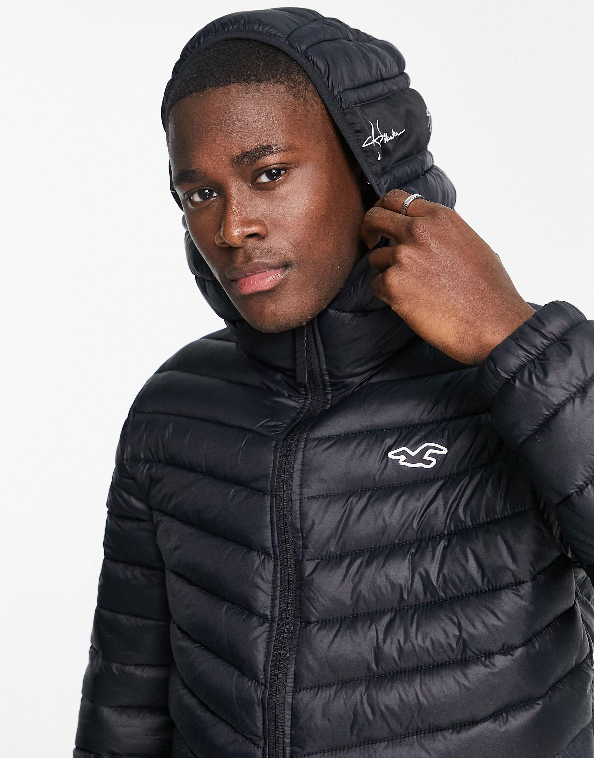 Hollister Icon/tape Logo Hooded Narrow Channel Lightweight Puffer Jacket in  Black for Men | Lyst