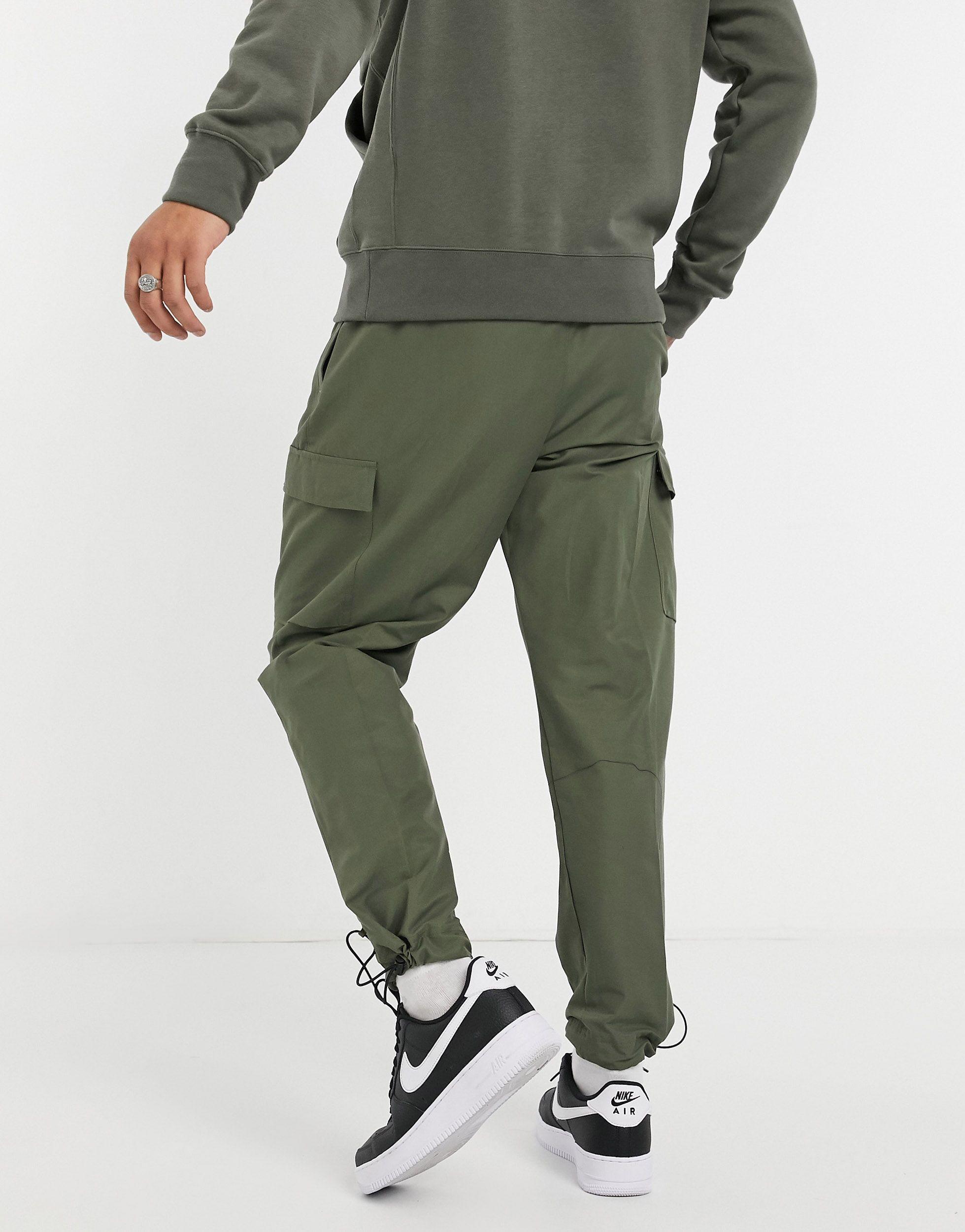 Nike Club Essentials Woven Cargo joggers in Green for Men | Lyst