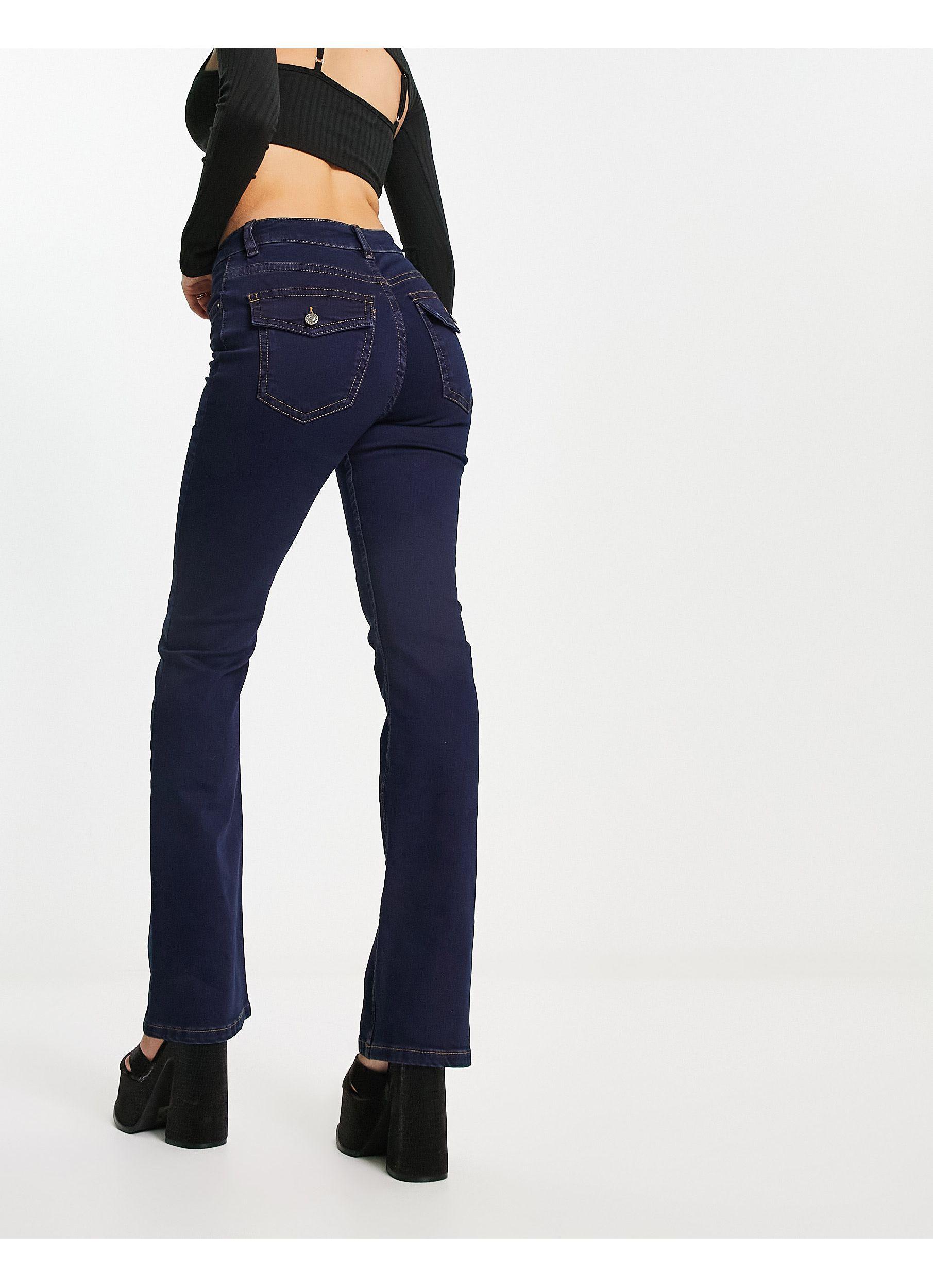 ASOS Flared Jeans Met Lage Taille En Western Zakken in het Blauw | Lyst NL