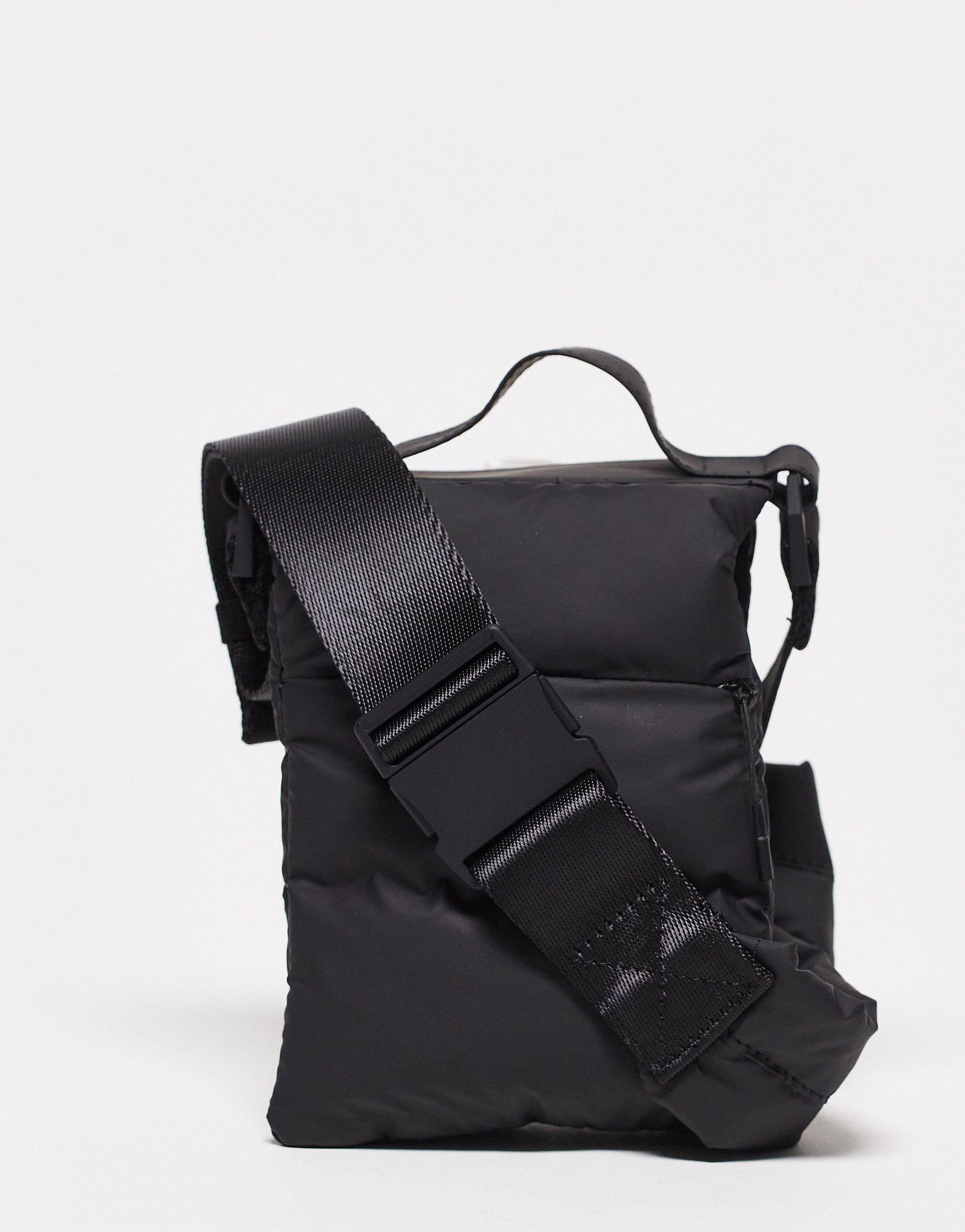 Rains Loop Puffer Money Pouch in Black for Men Lyst UK