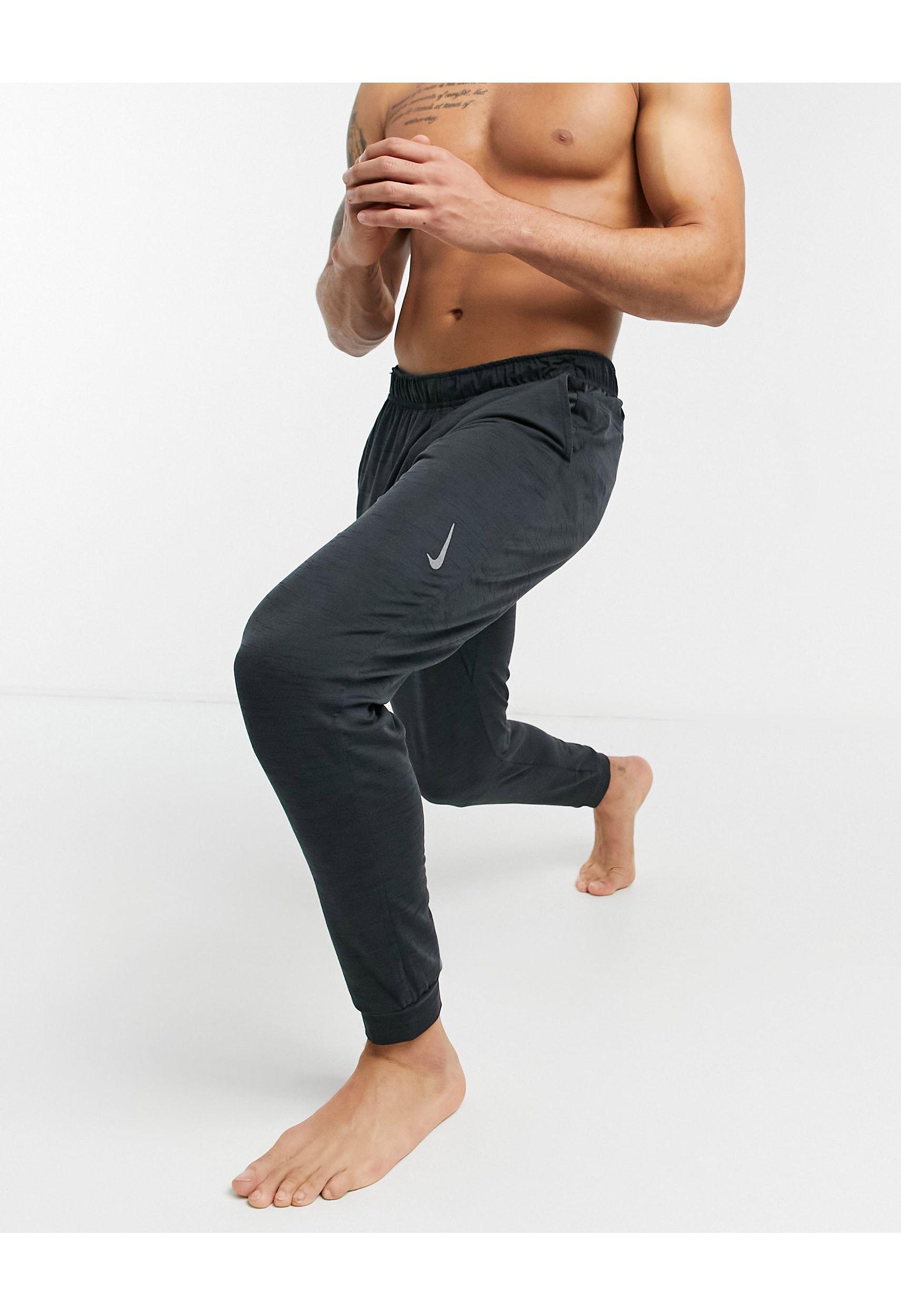 Nike Nike Yoga Dri-fit joggers in Grey for Men